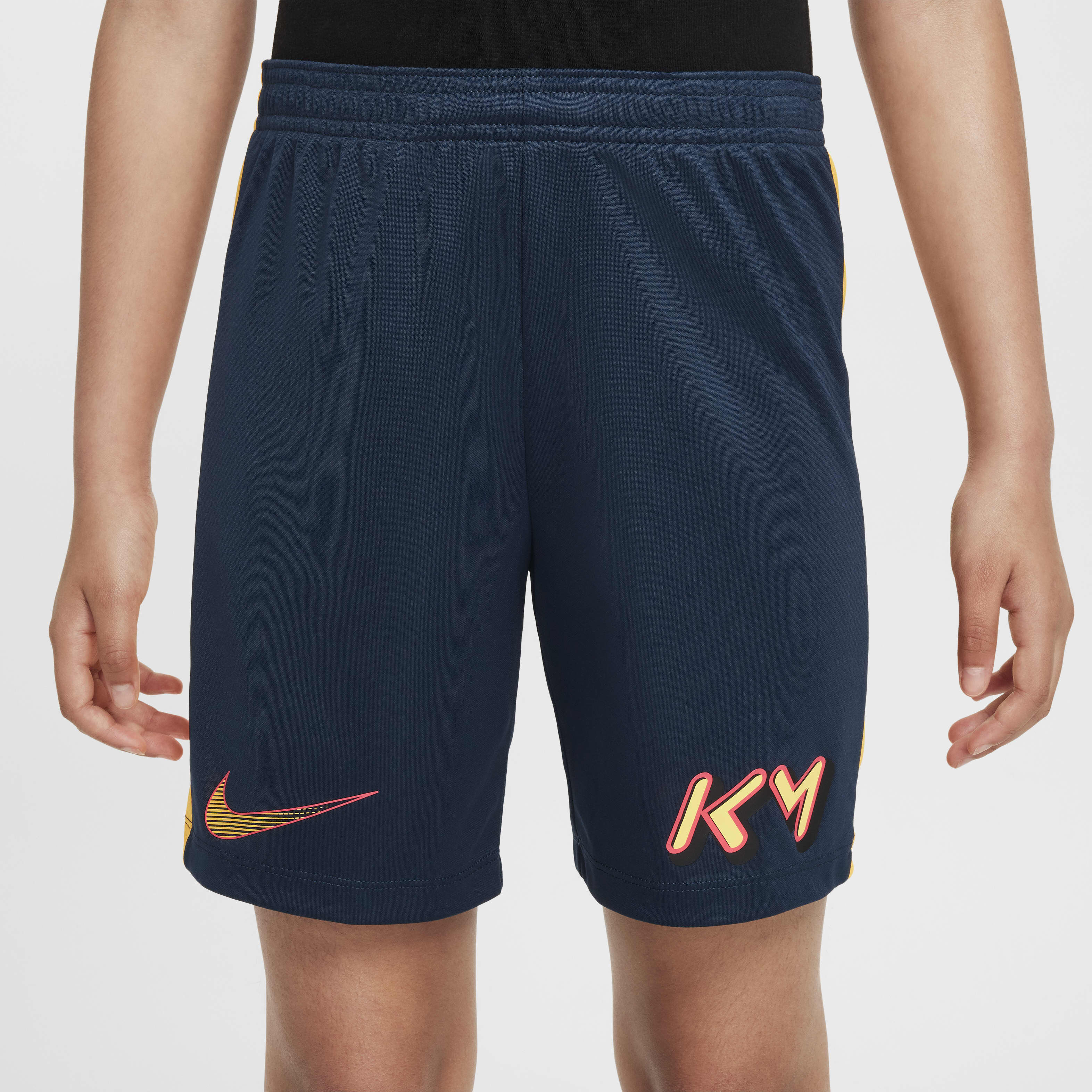 Buy Kylian Mbappe Older Kids Dri FIT Academy Football Shorts Armoury Navy Laser Orange Nike UAE Official