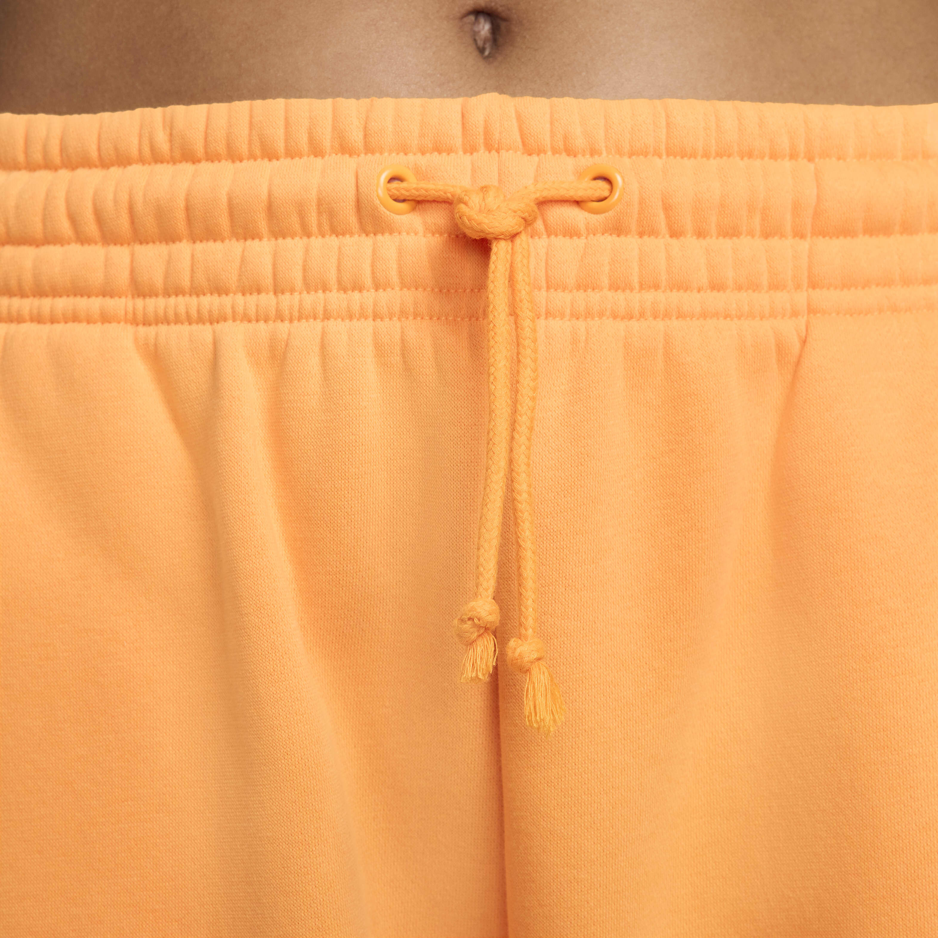 Yellow nike tracksuit bottoms 2025