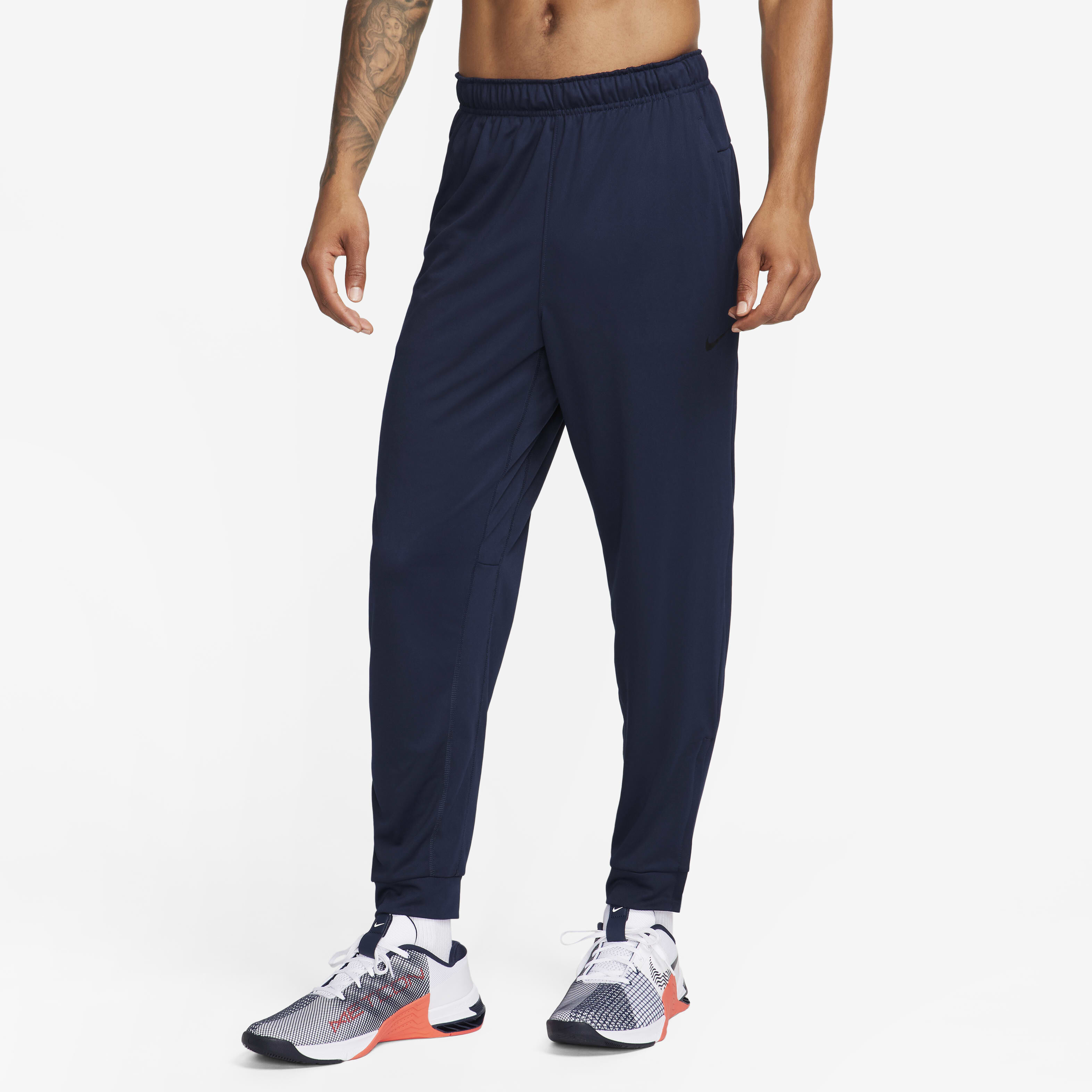 Buy Nike Totality Men s Dri FIT Tapered Versatile Trousers Nike UAE Official