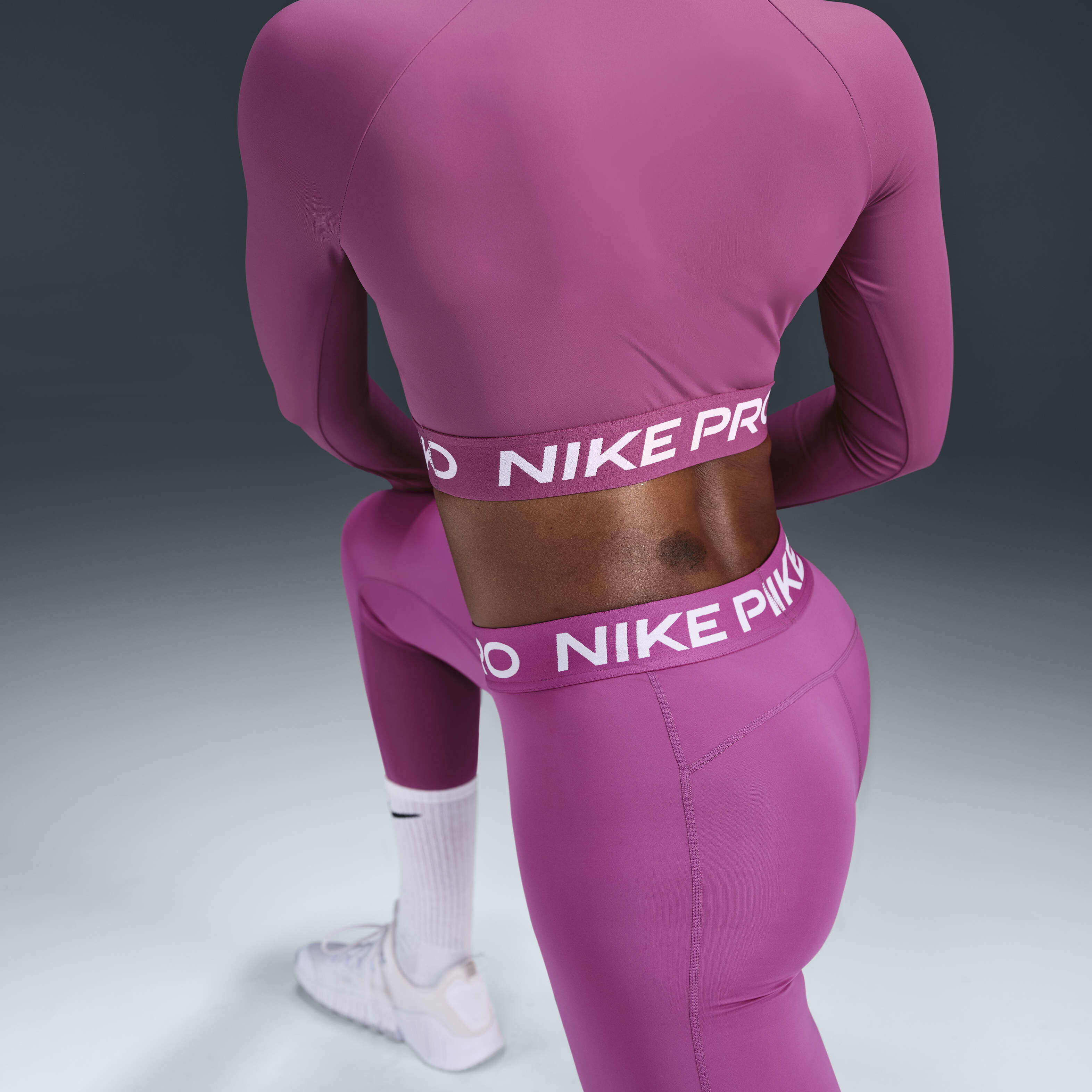 Buy Nike Pro Women's Mid-Rise Mesh-Panelled Leggings - Hot Fuchsia/White |  Nike UAE Official