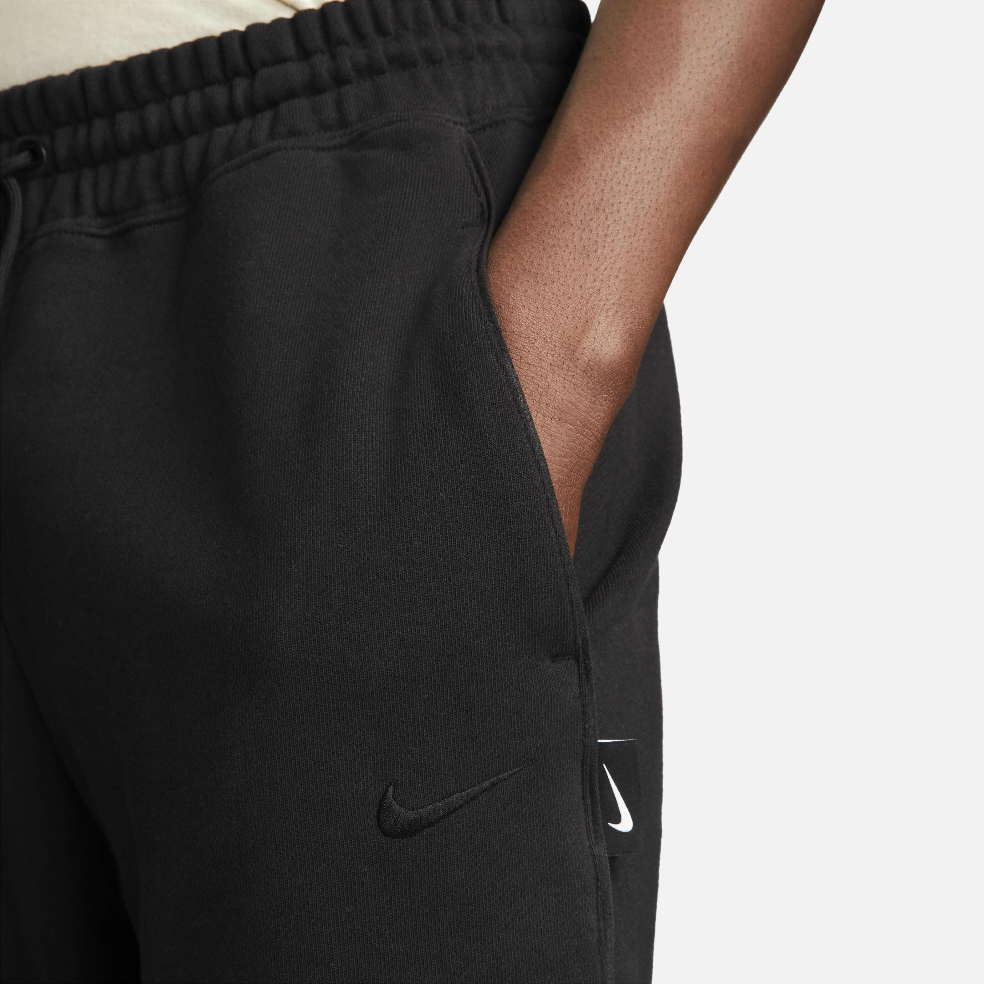 Swoosh tracksuit bottoms online