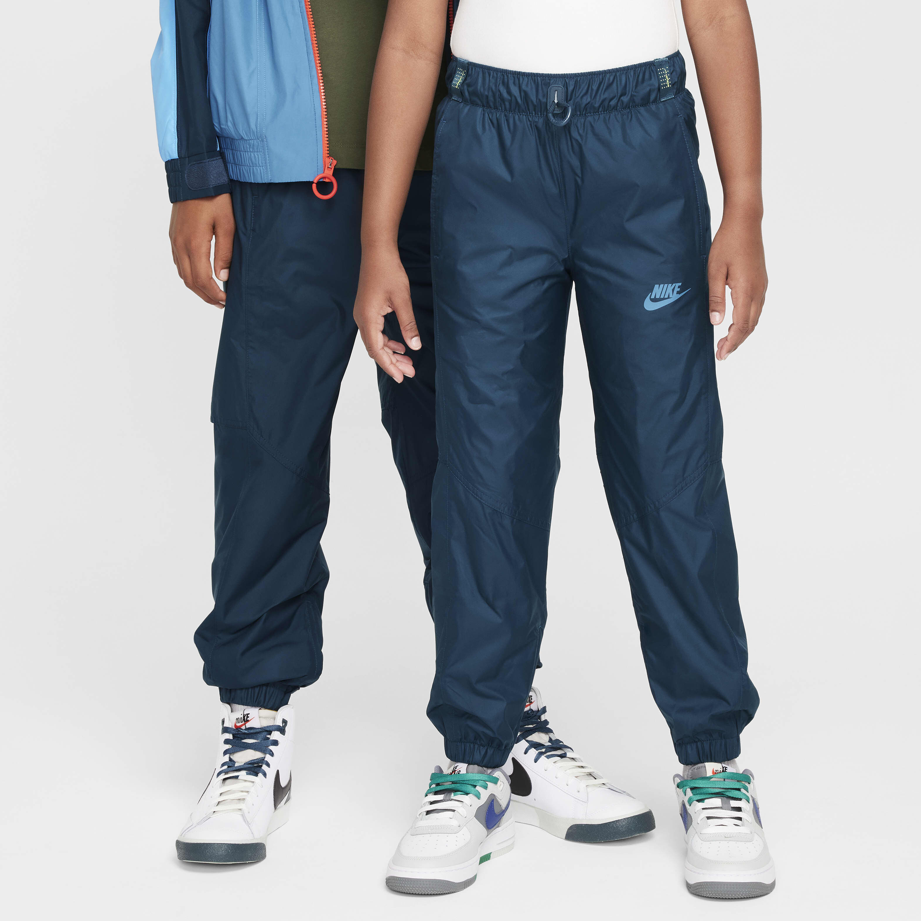 Buy Nike Sportswear Windrunner EasyOn Older Kids Repel Trousers Armoury Navy Aegean Storm Nike UAE Official