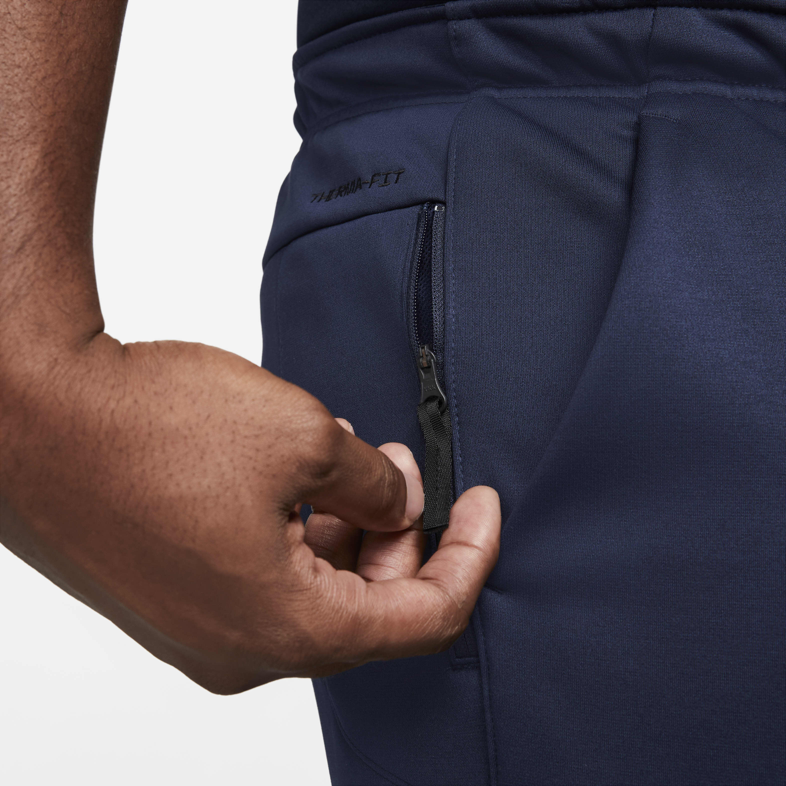 Nike therma men's tapered training trousers outlet
