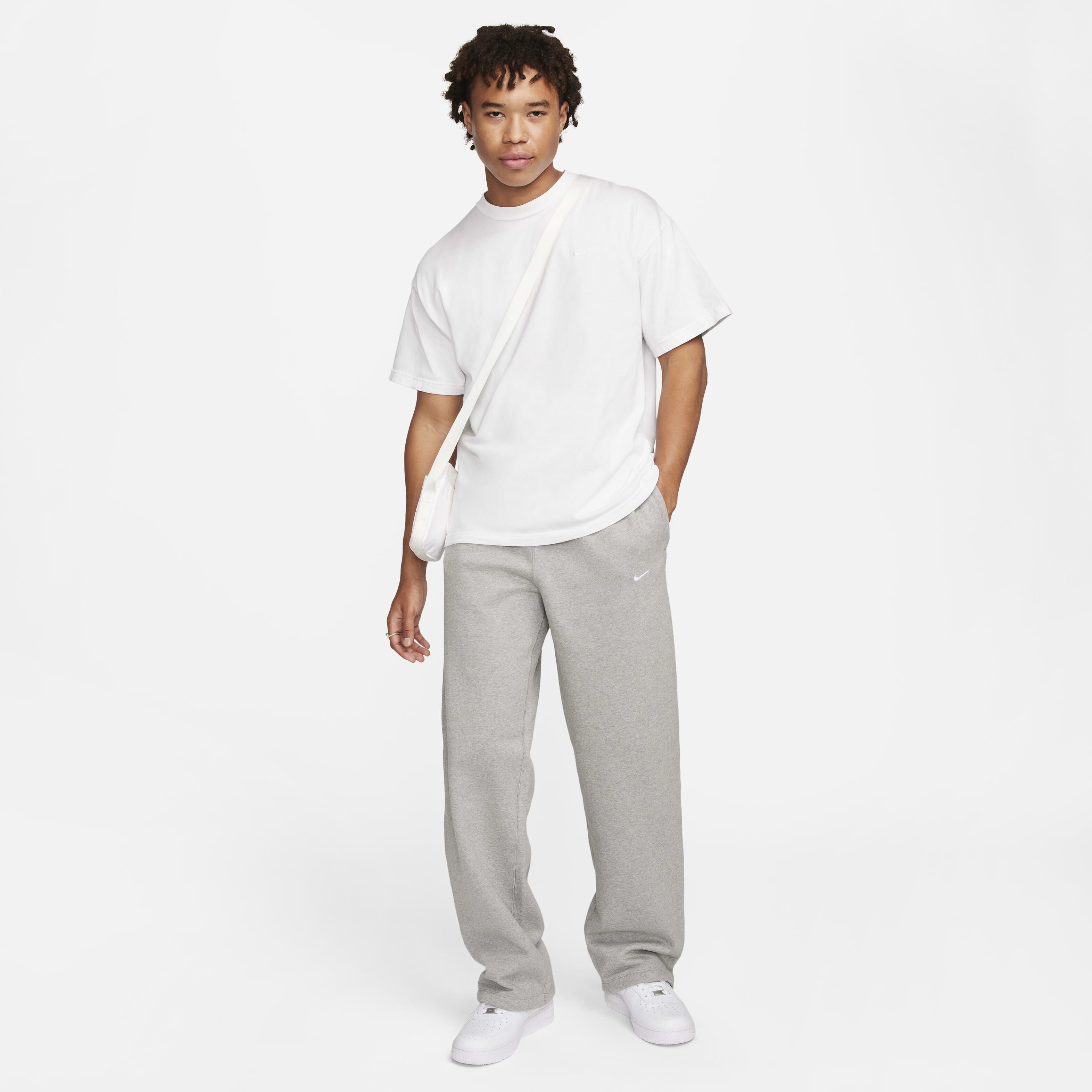 Buy Nike Solo Swoosh Men s Open Hem Fleece Trousers Nike UAE Official