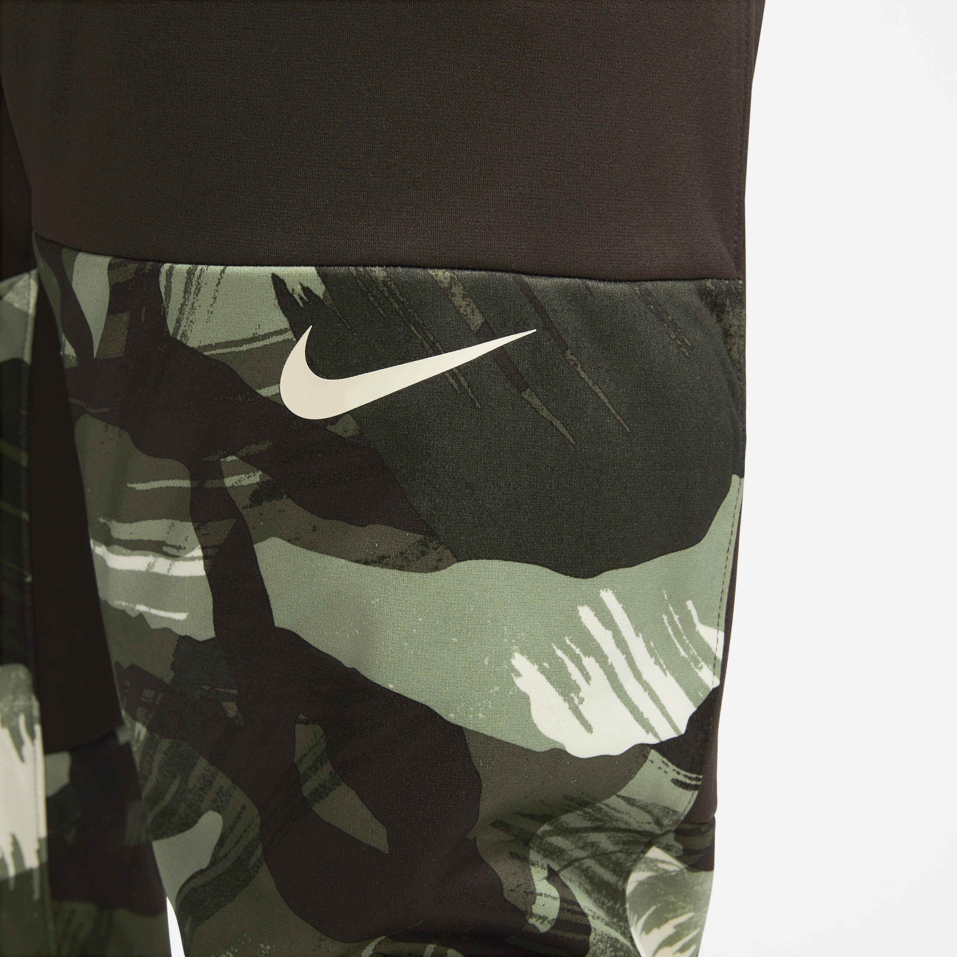 Buy Nike Therma FIT Men s Camo Tapered Training Trousers Velvet Brown Coconut Milk Nike UAE Official