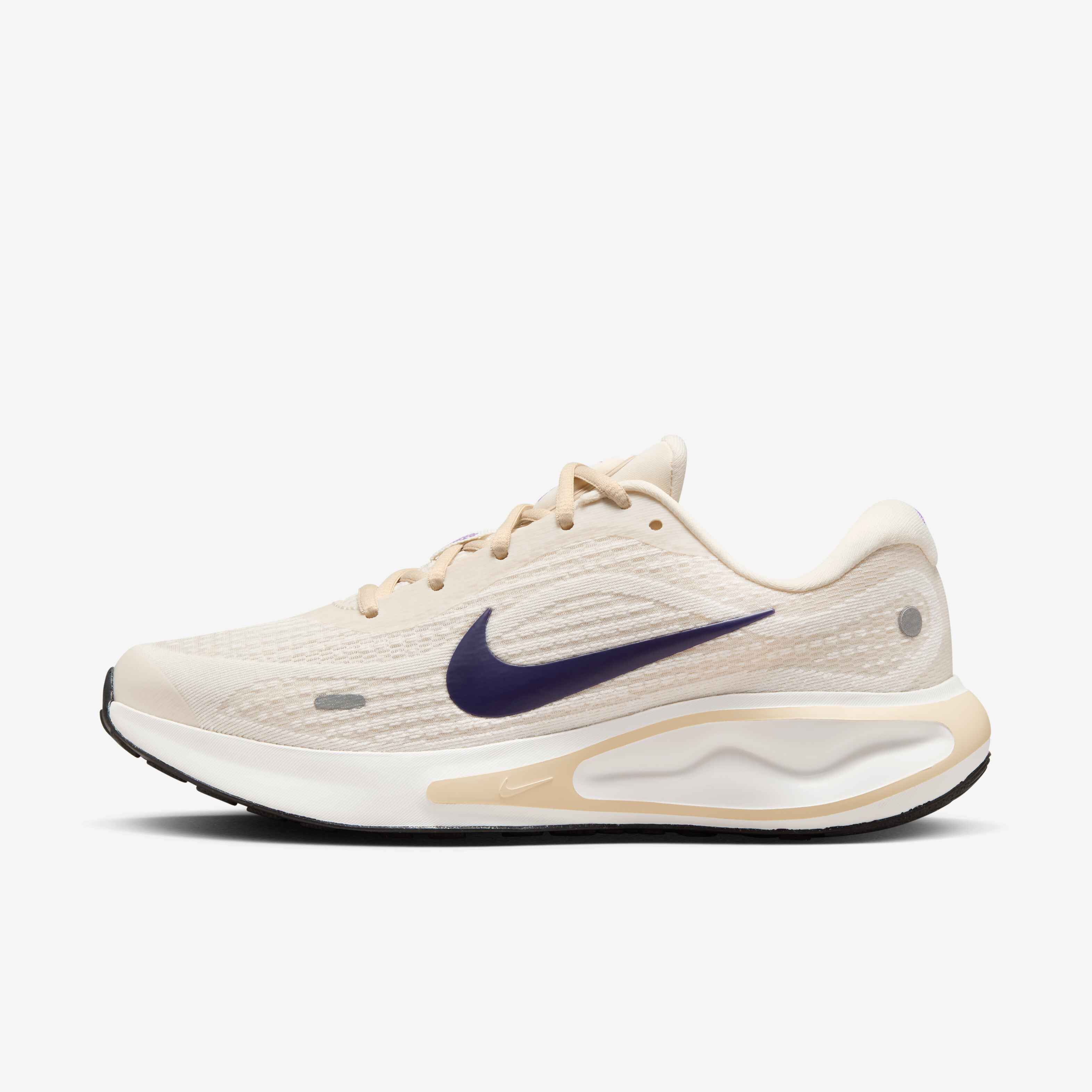 white and gold nike running shoes