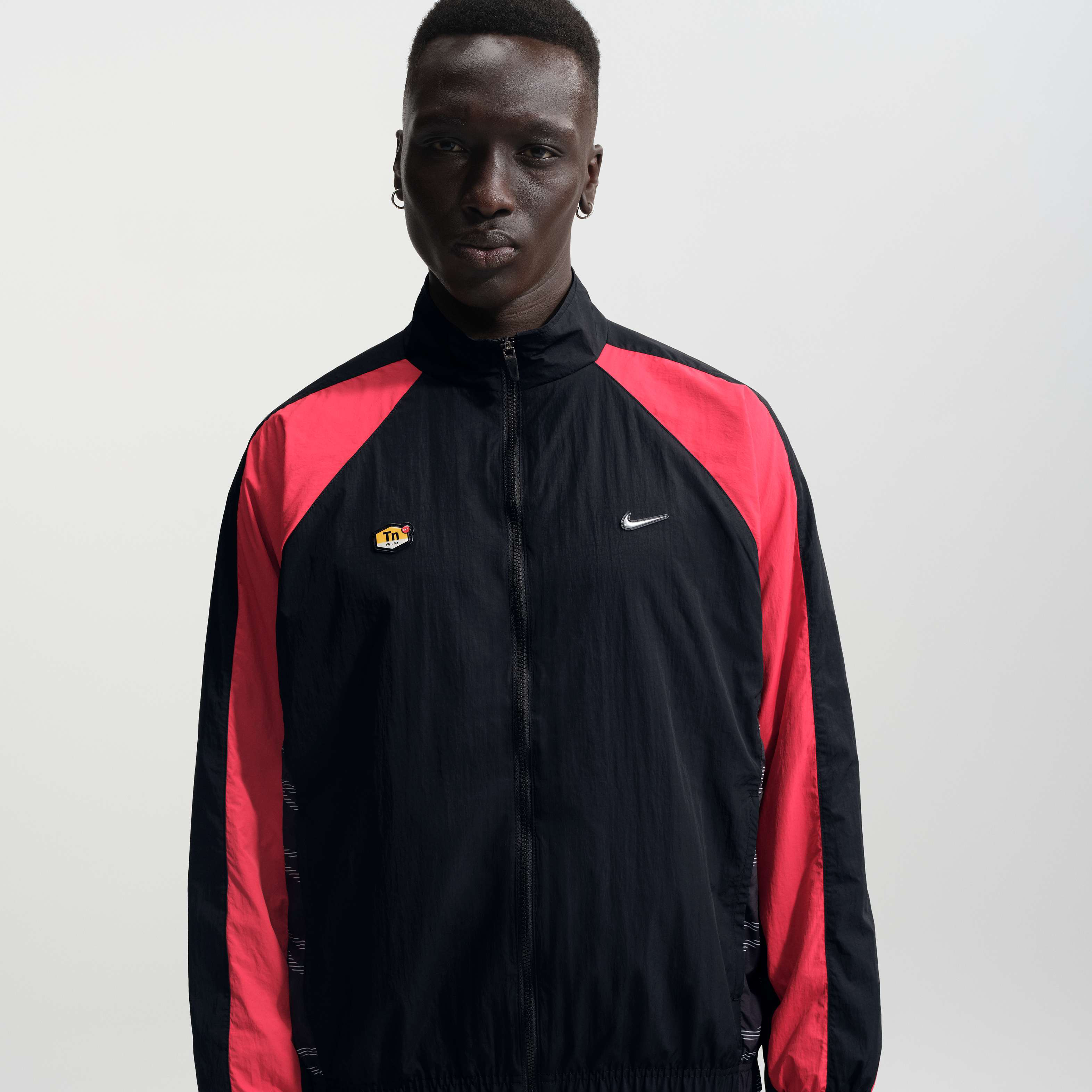 red nike track top