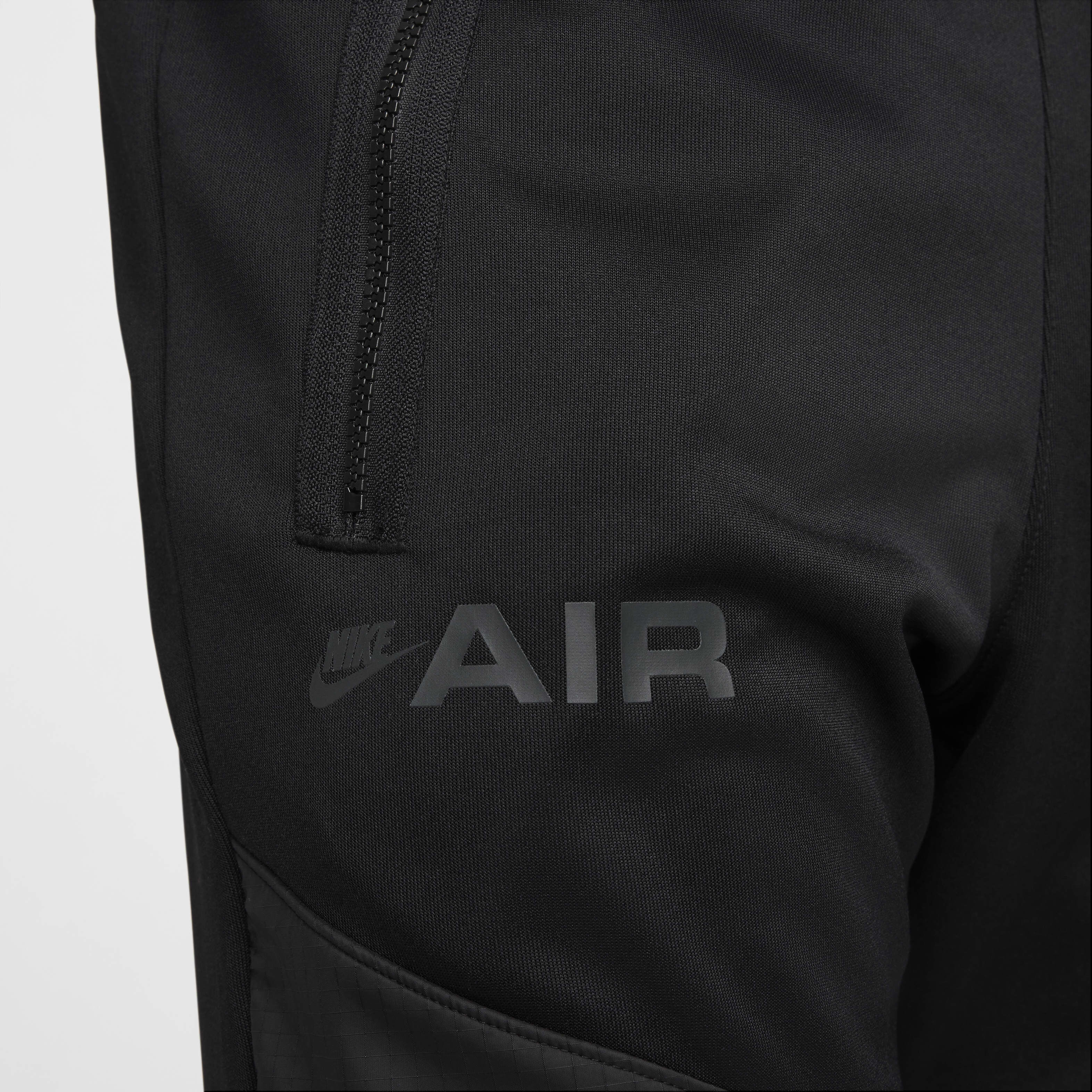 Nike air cuffed joggers in black best sale