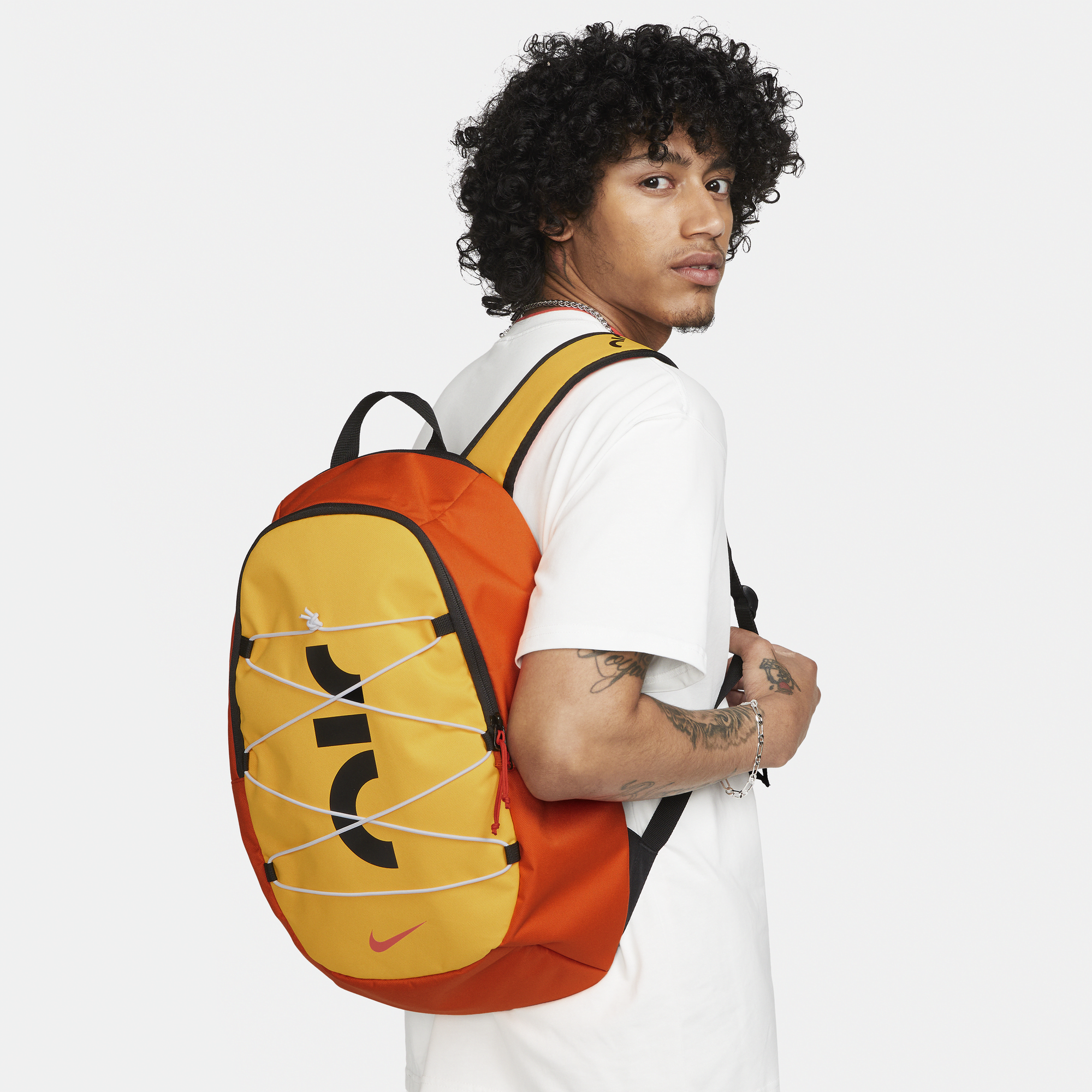 Orange and best sale black nike backpack