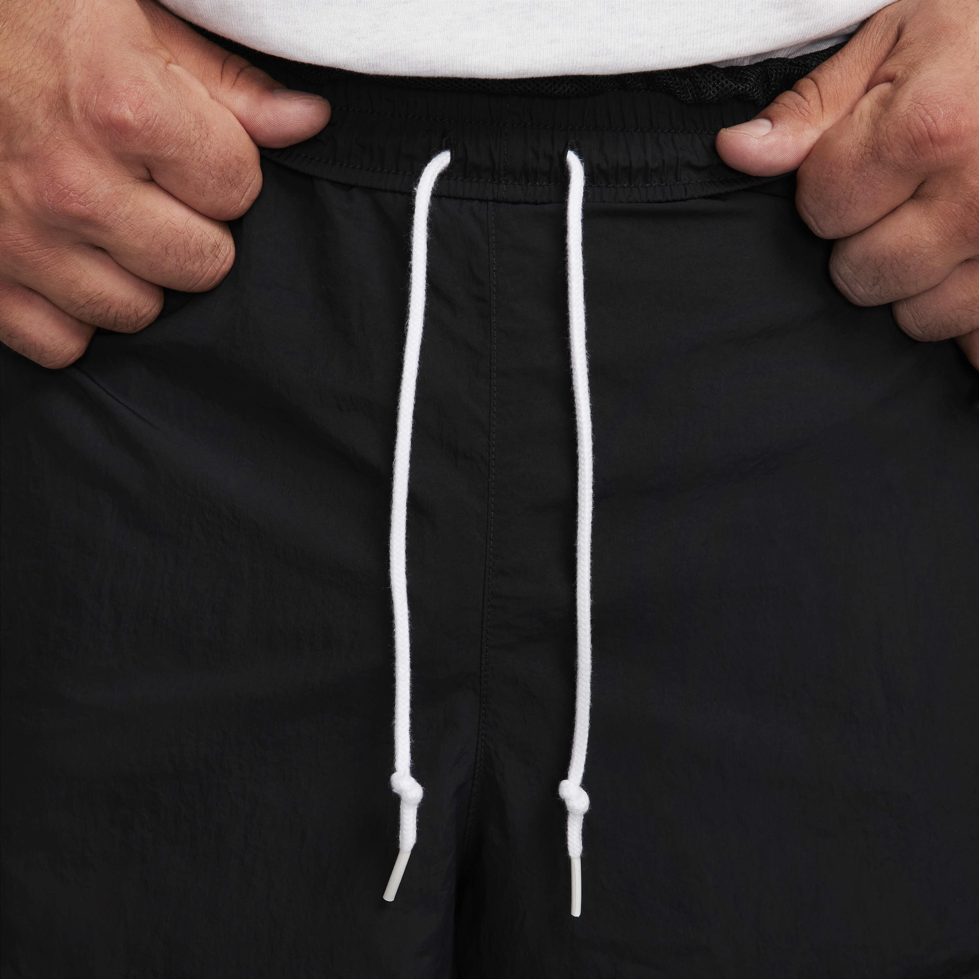 Swoosh tracksuit bottoms on sale