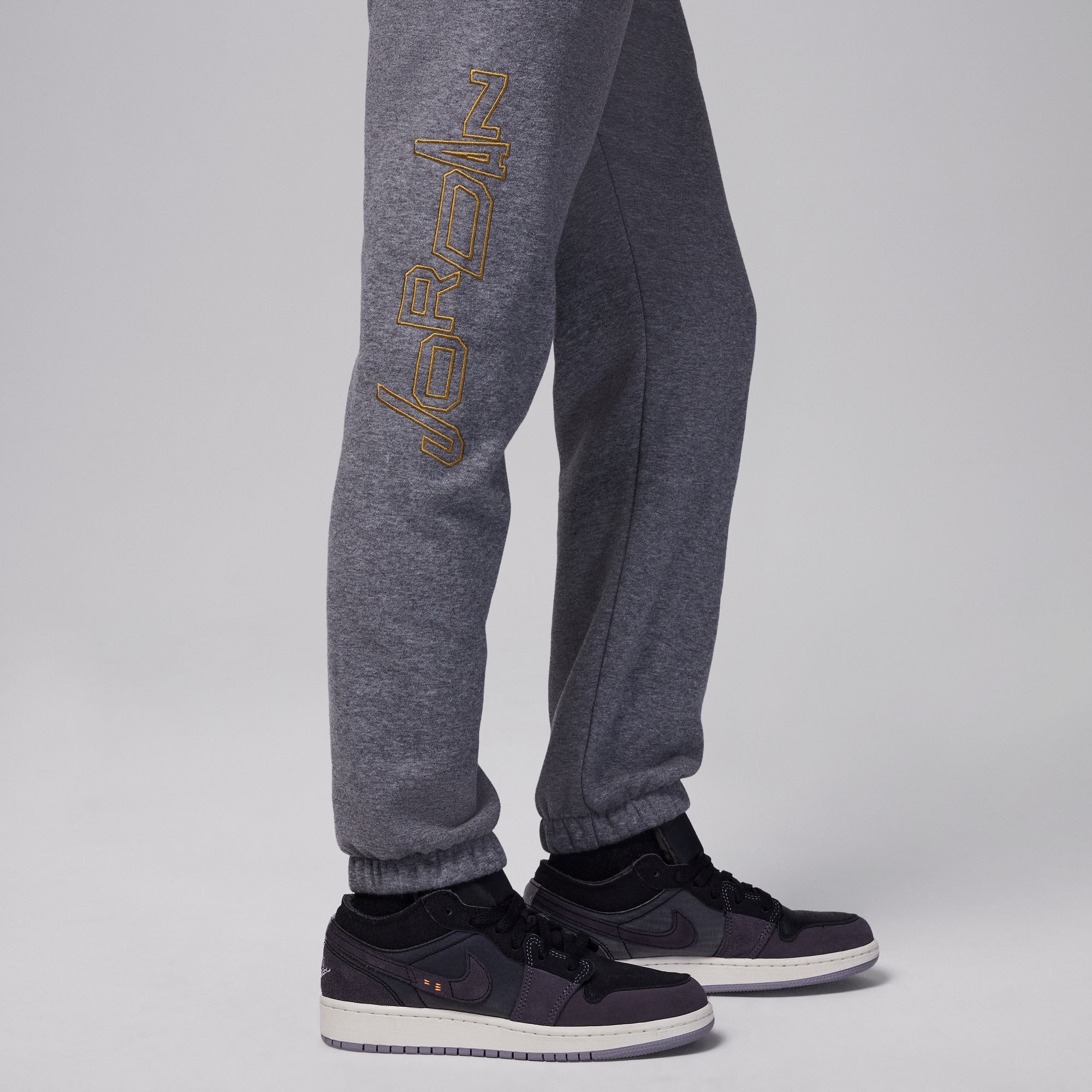 Jordan Take Flight Black and Gold Fleece Trousers image number 2