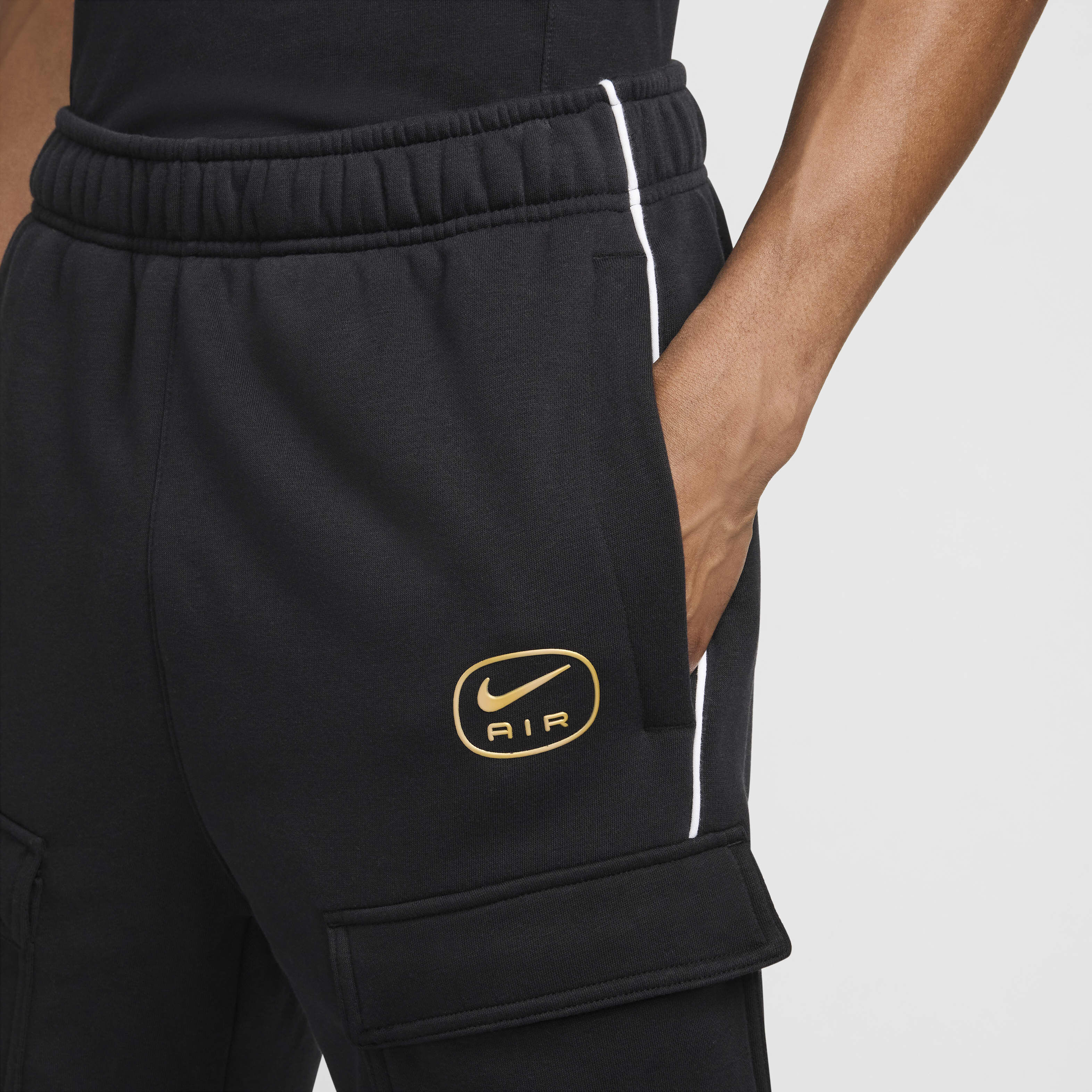 Nike graphic outline swoosh cuffed cargo joggers in black cheap