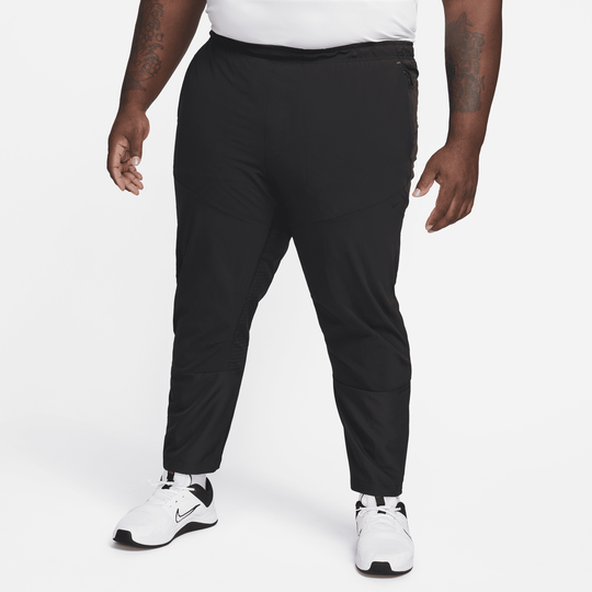 Shop APS Men's Dri-FIT ADV Woven Versatile Trousers | Nike UAE