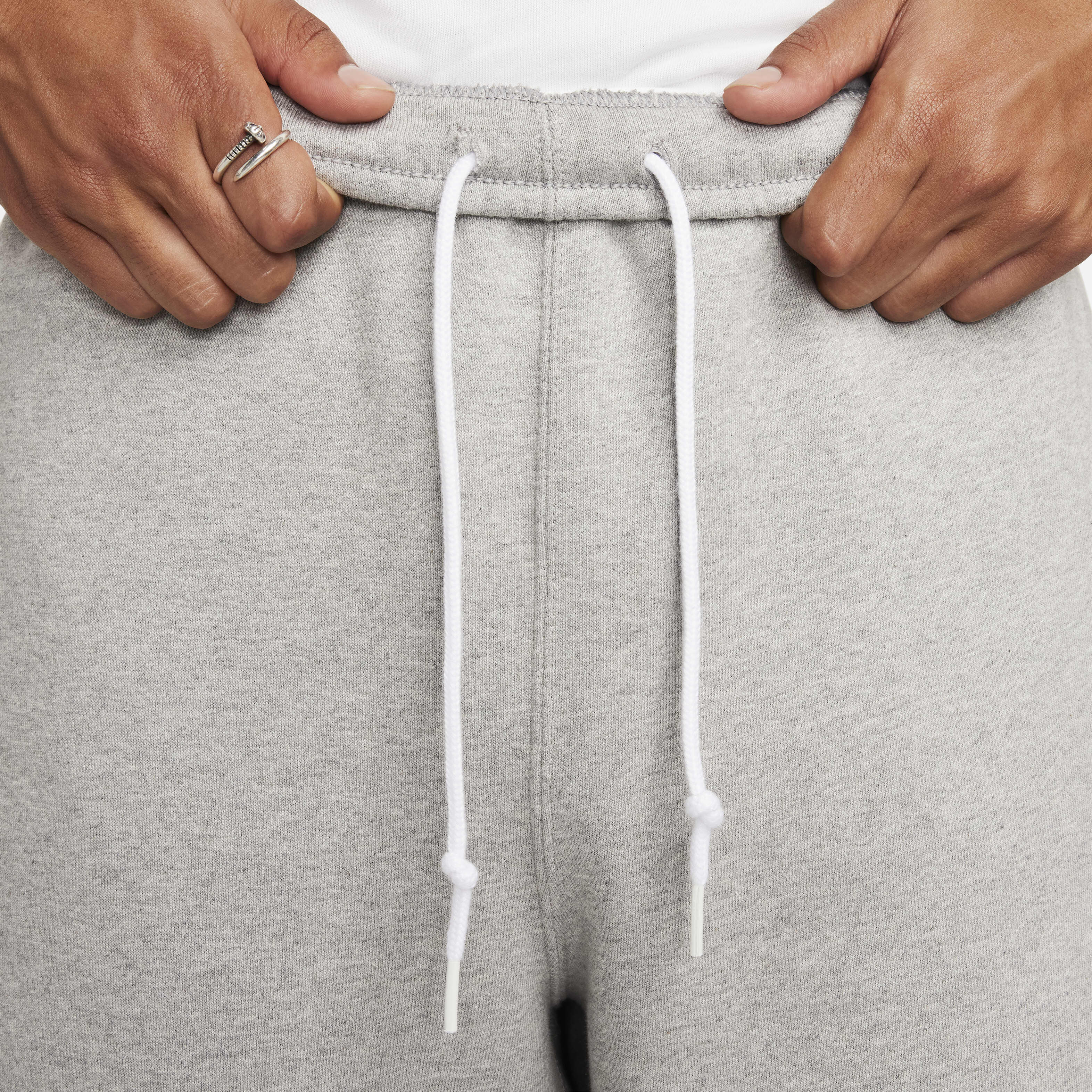 Buy Nike Solo Swoosh Men s Open Hem Fleece Trousers Nike UAE Official