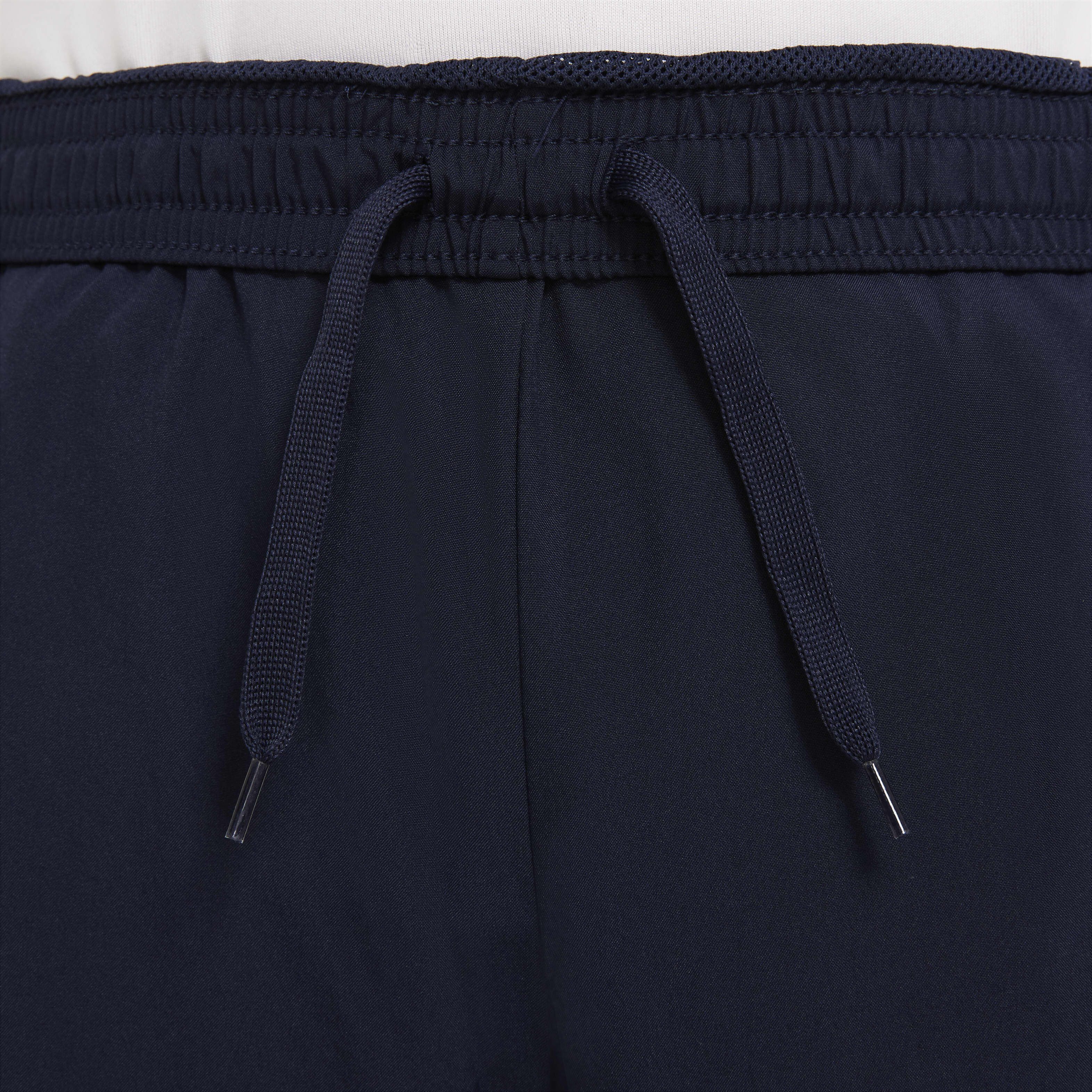 Nike navy blue tracksuit bottoms online