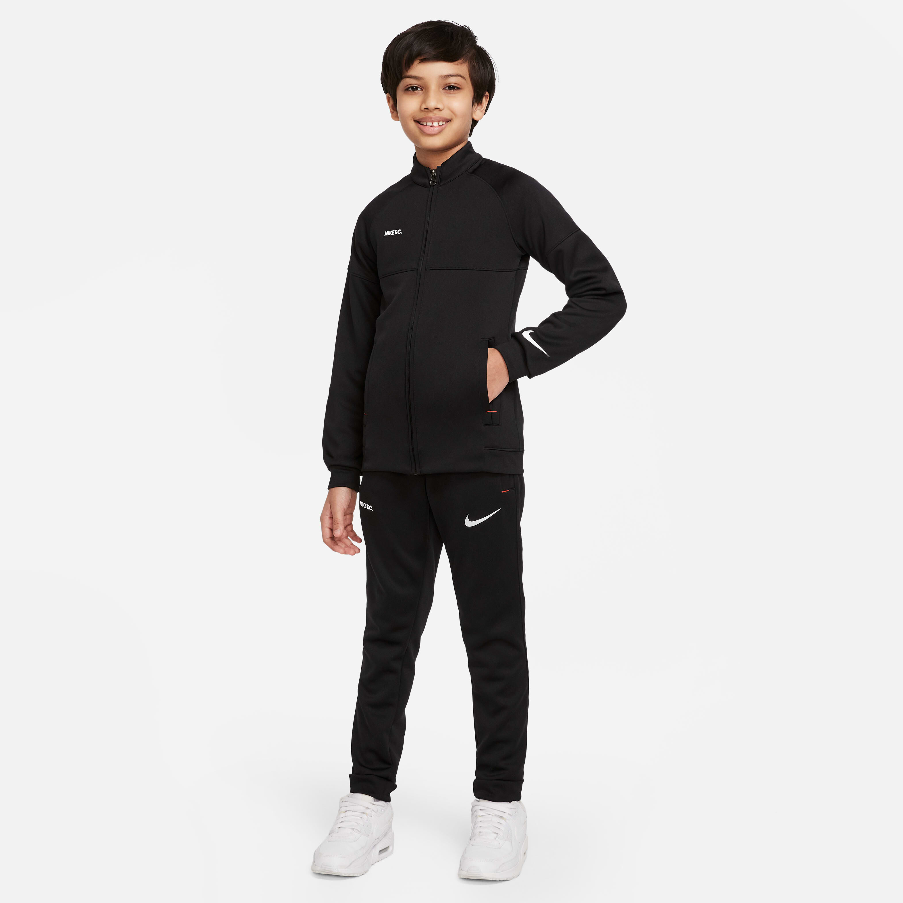 Nike tracksuit with pockets online