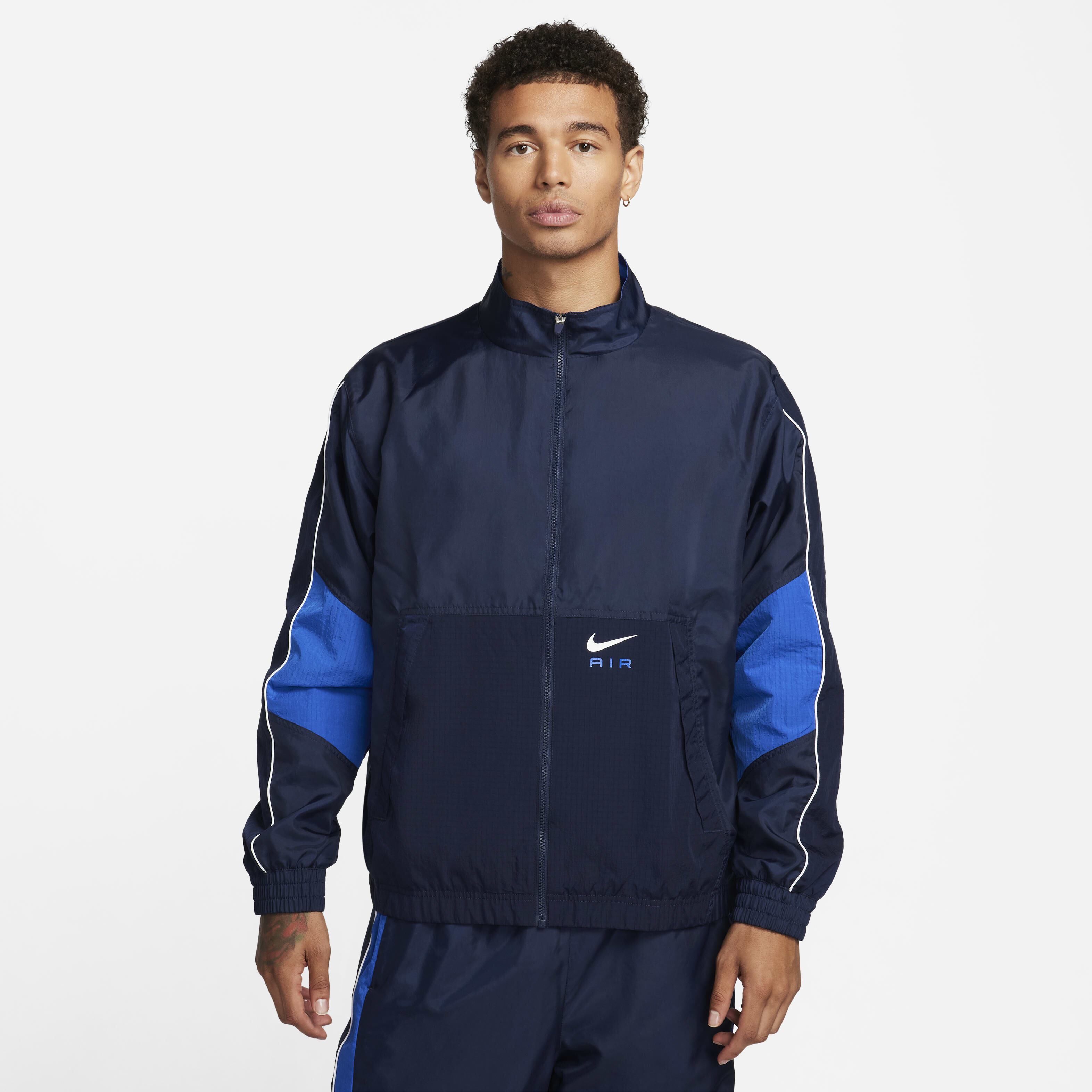Buy Nike Air Men s Woven Tracksuit Jacket Obsidian Game Royal Nike UAE Official
