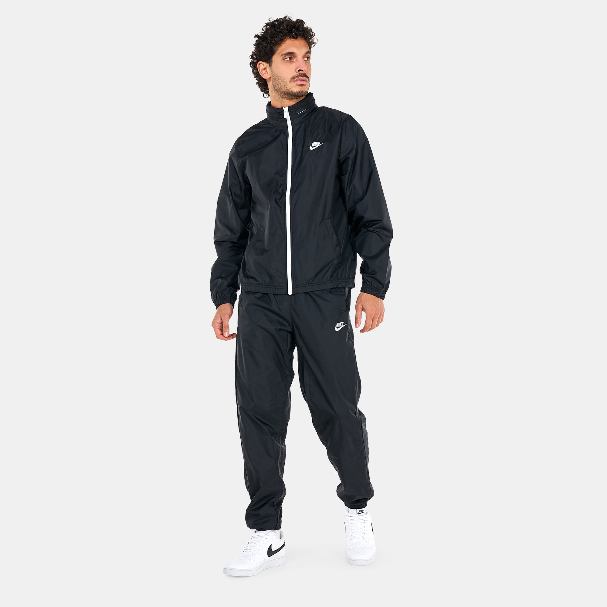 Orange and black hot sale nike jogging suit