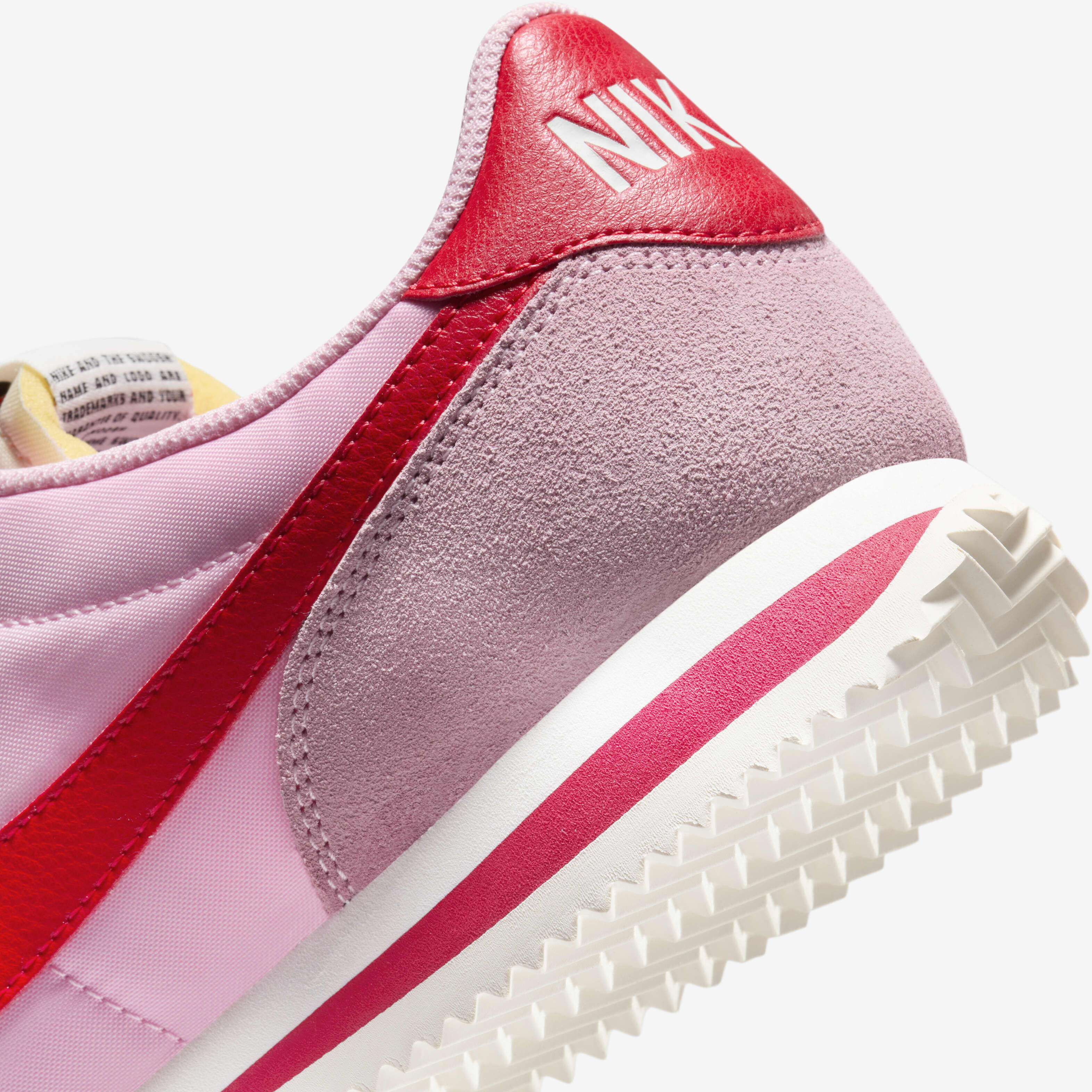Neon pink nike cortez sales