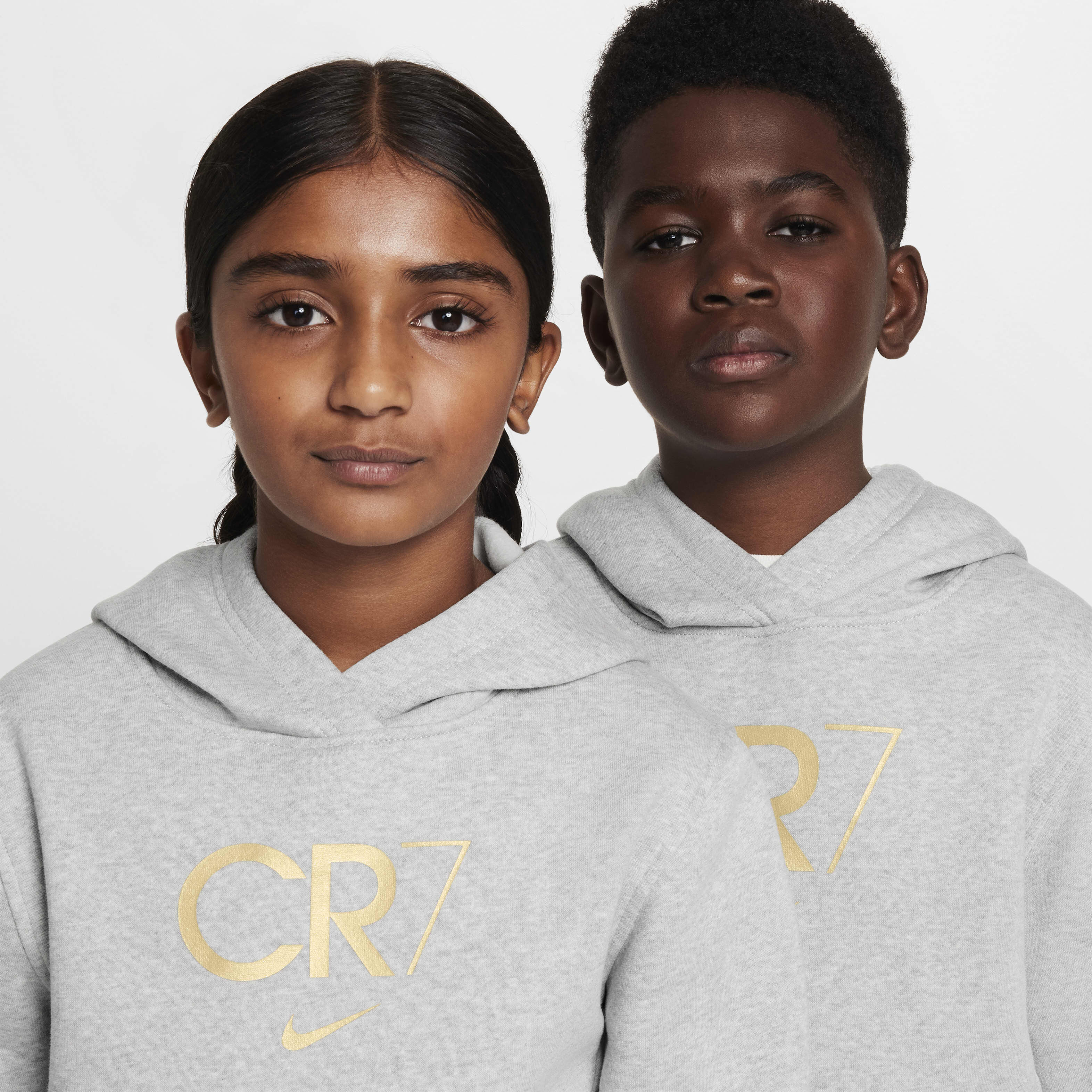 Buy CR7 Club Fleece Older Kids' Football Hoodie - Light Smoke  Grey/Heather/Metallic Gold | Nike UAE Official