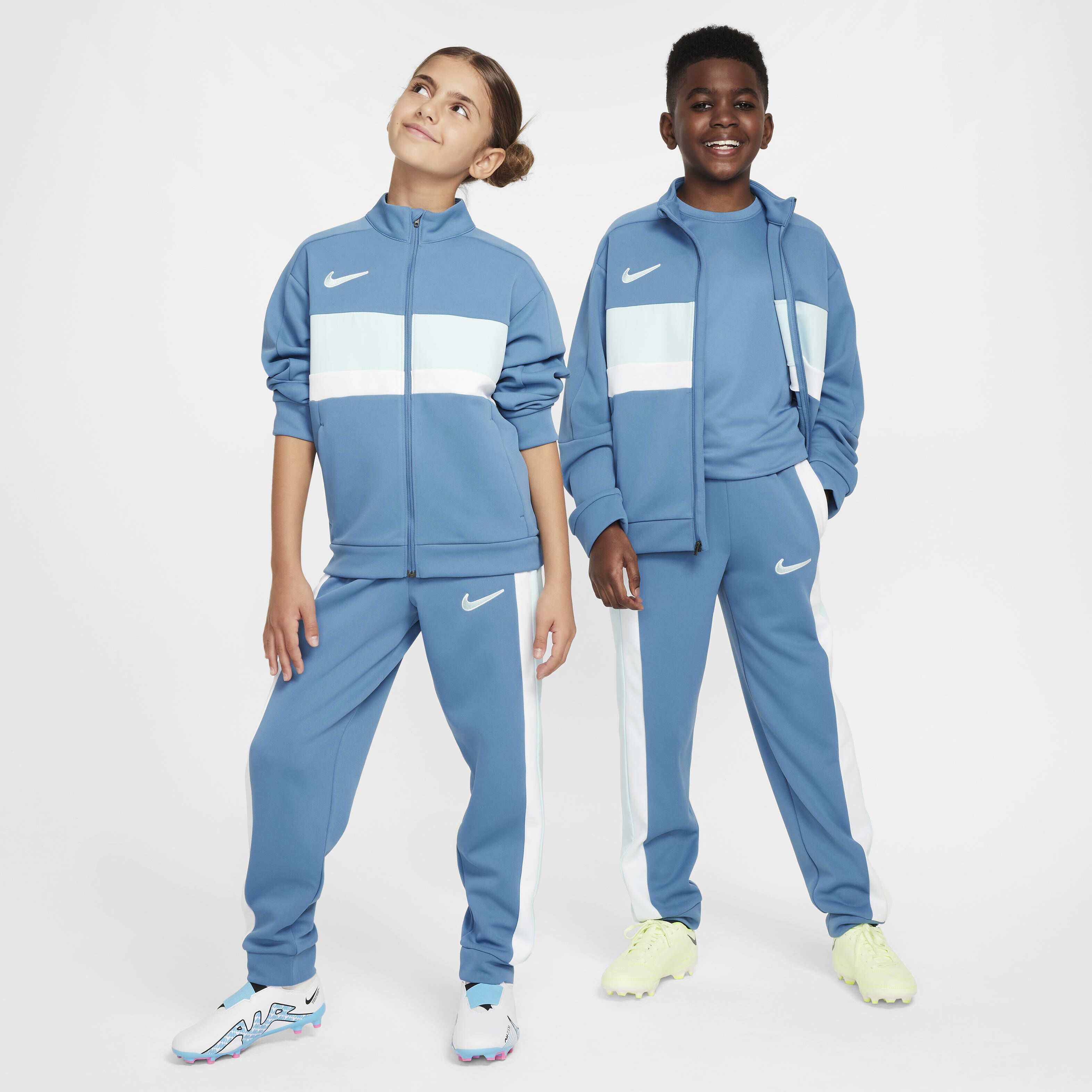 Blue nike tracksuit bottoms store