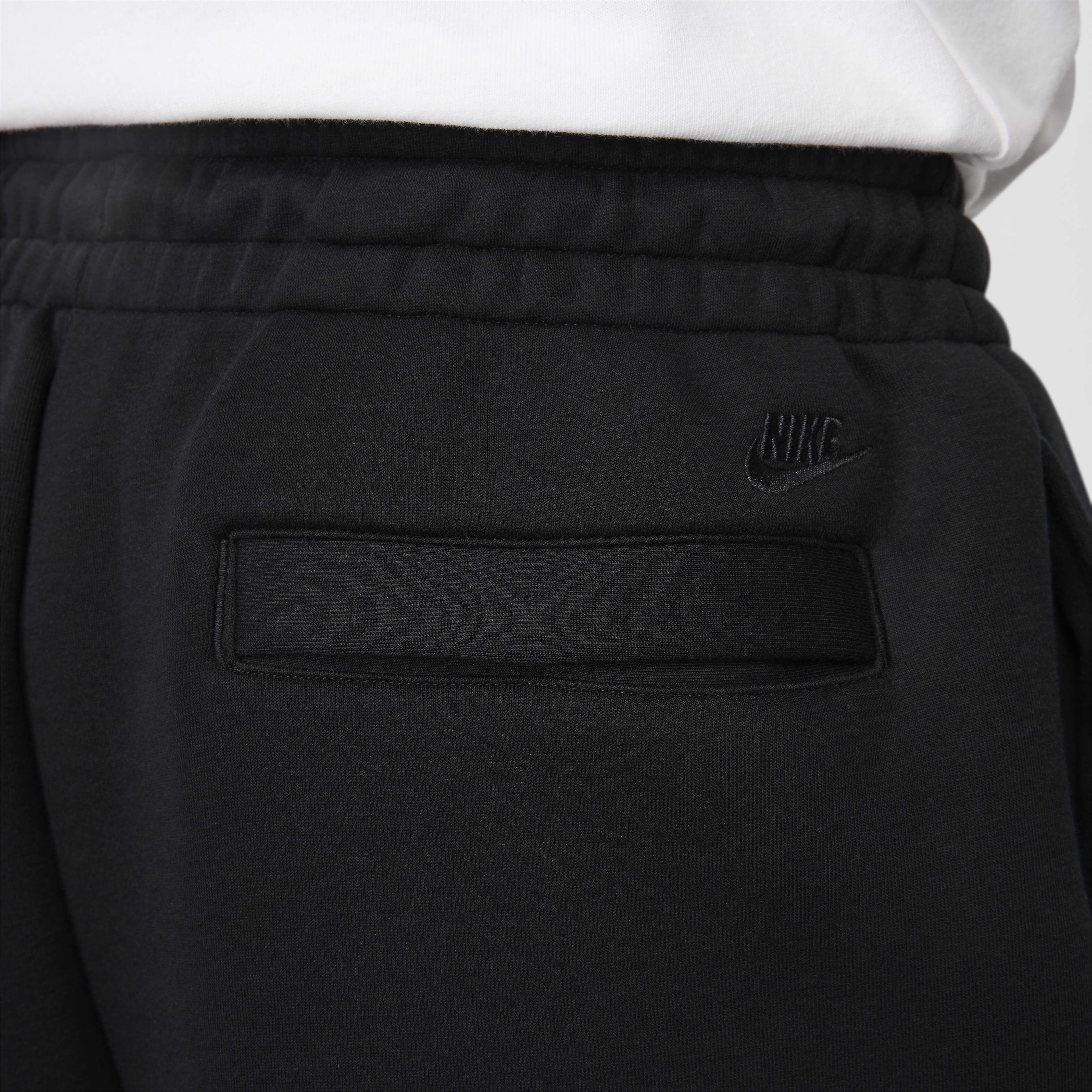 Blue nike tech pants store