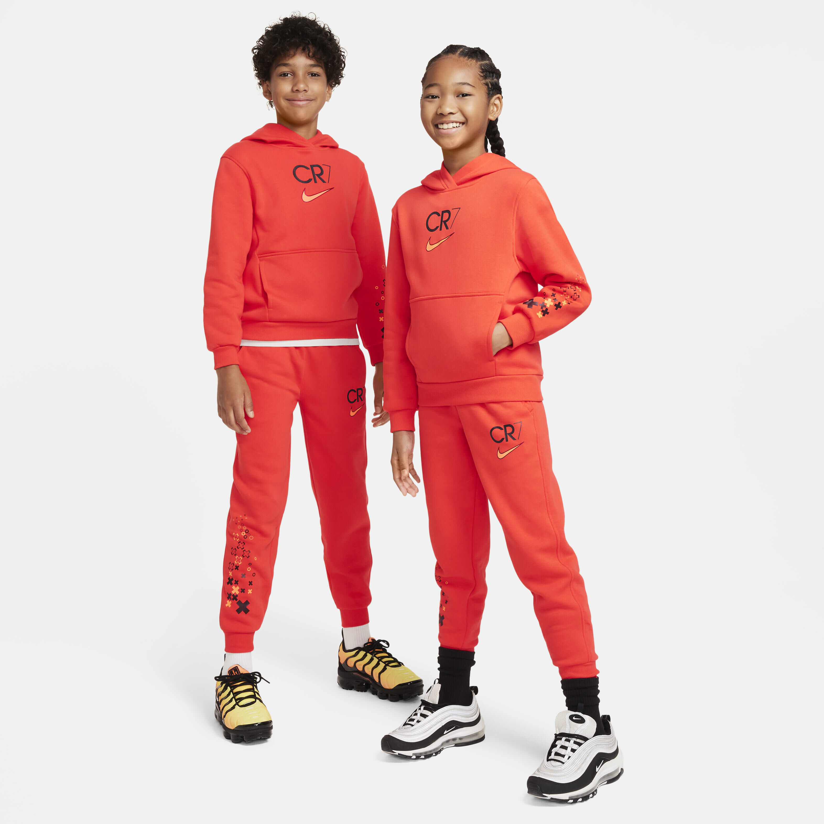 Buy CR7 Older Kids Club Fleece Hoodie Light Crimson Nike UAE Official