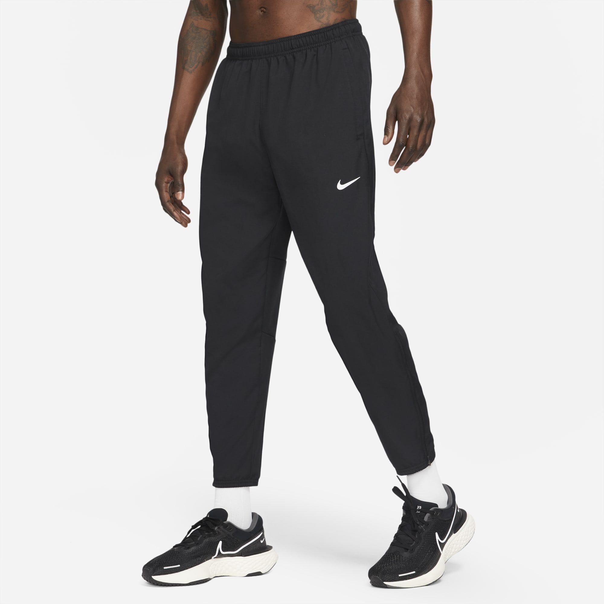 Essential men's woven running trousers store