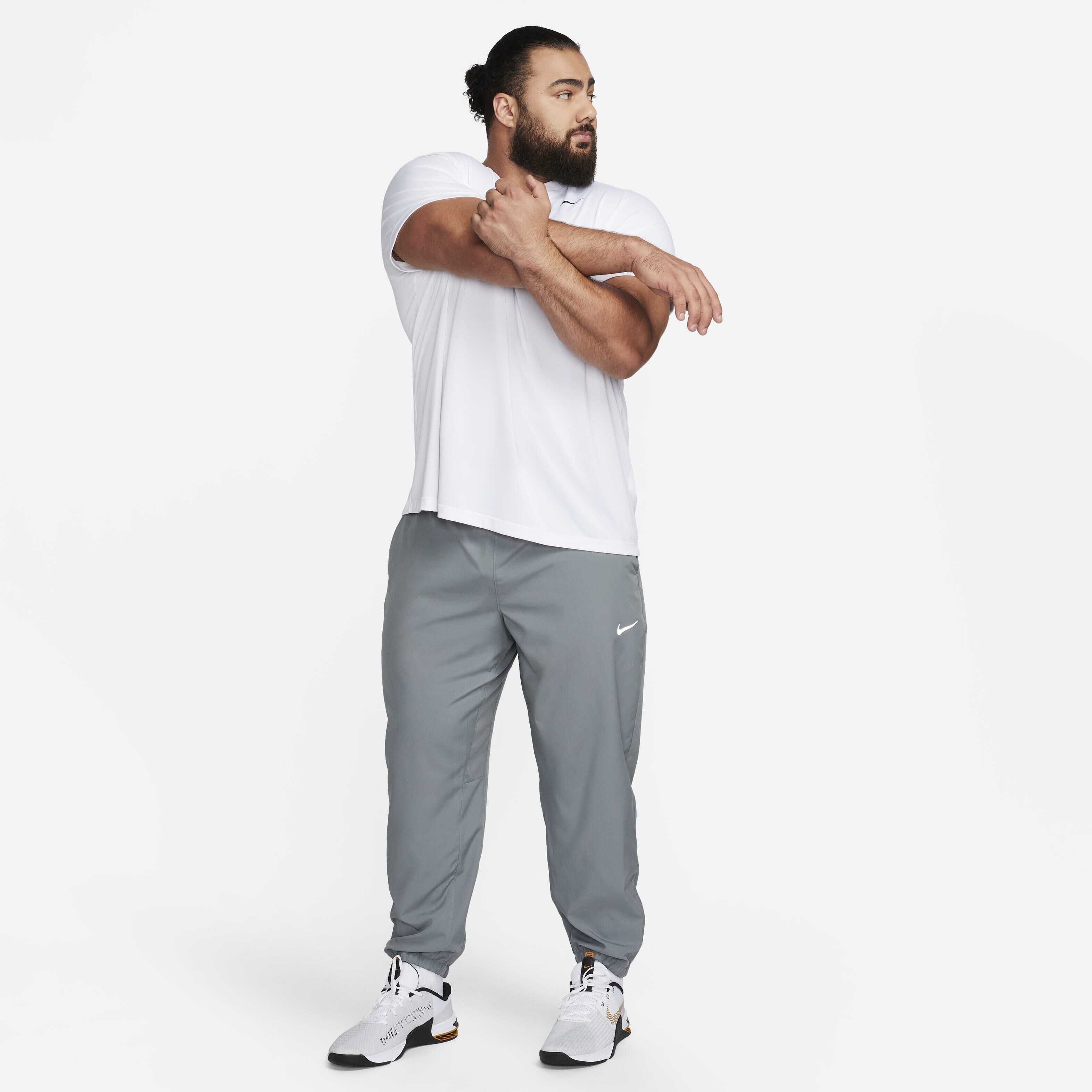 Buy Nike Form Men's Dri-FIT Tapered Versatile Trousers
