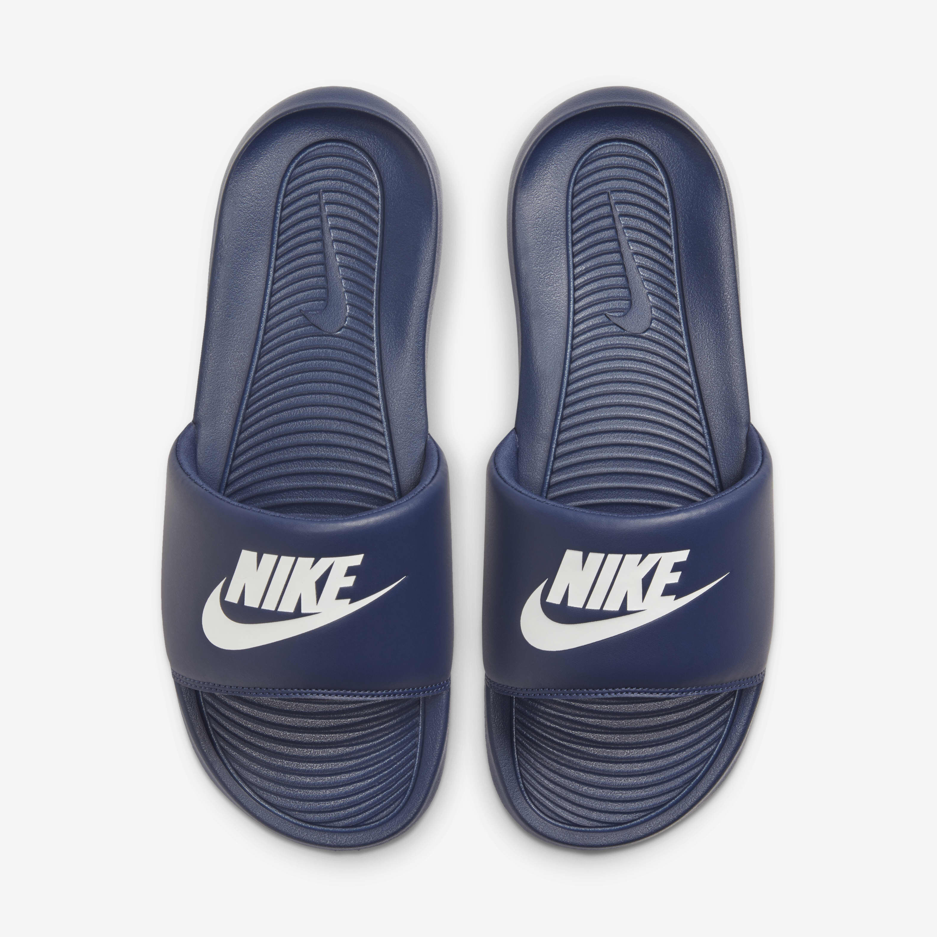 Buy Nike Victori One Men s Slides Midnight Navy Midnight Navy White Nike UAE Official