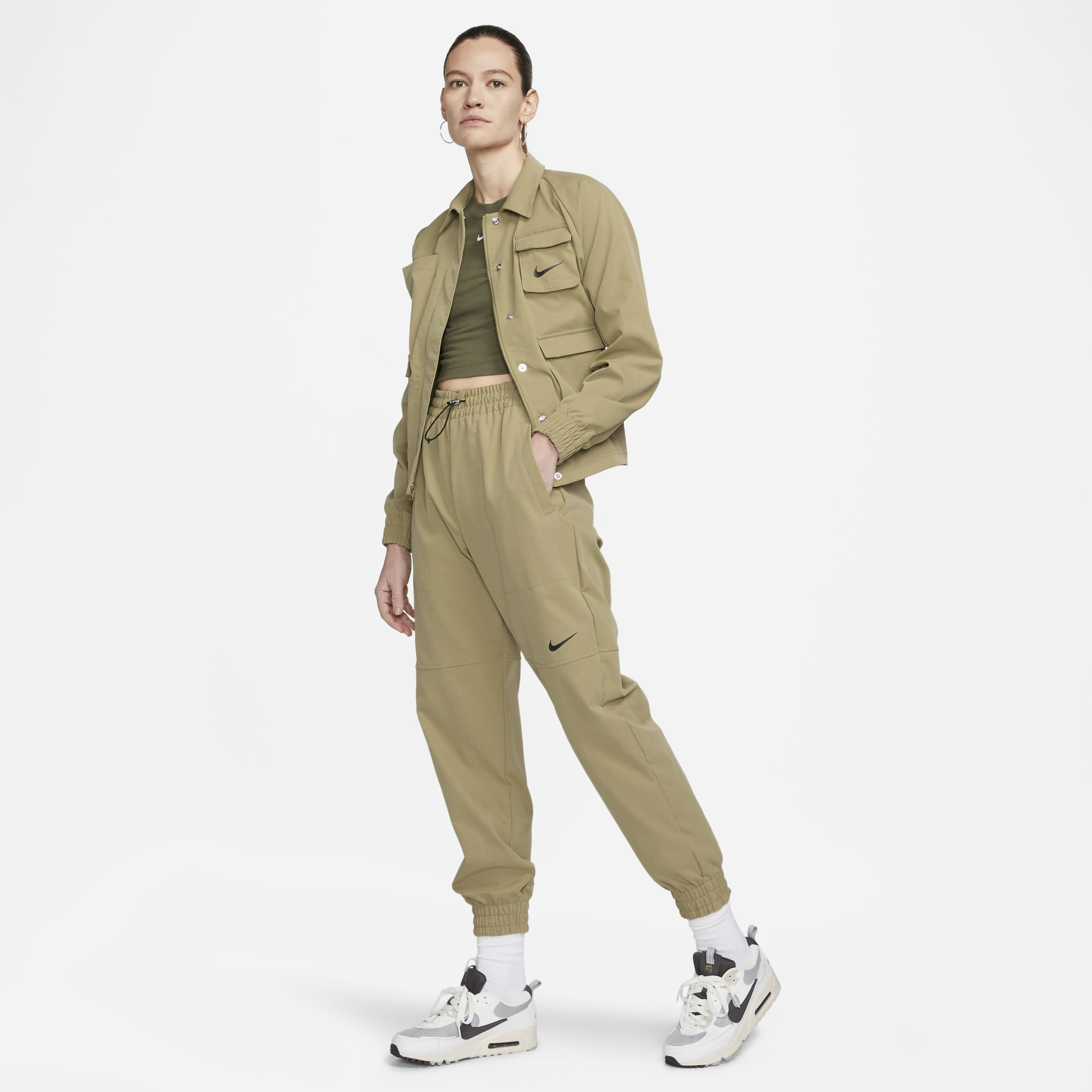 Buy Nike Sportswear Swoosh Women s Woven Trousers Neutral Olive Black Nike UAE Official