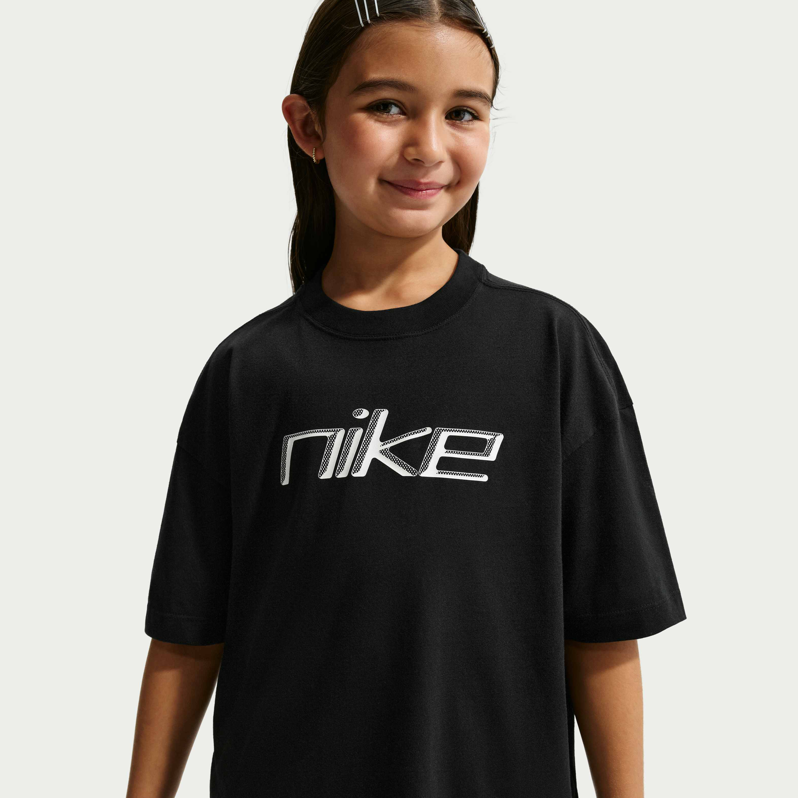 silver and black nike shirt