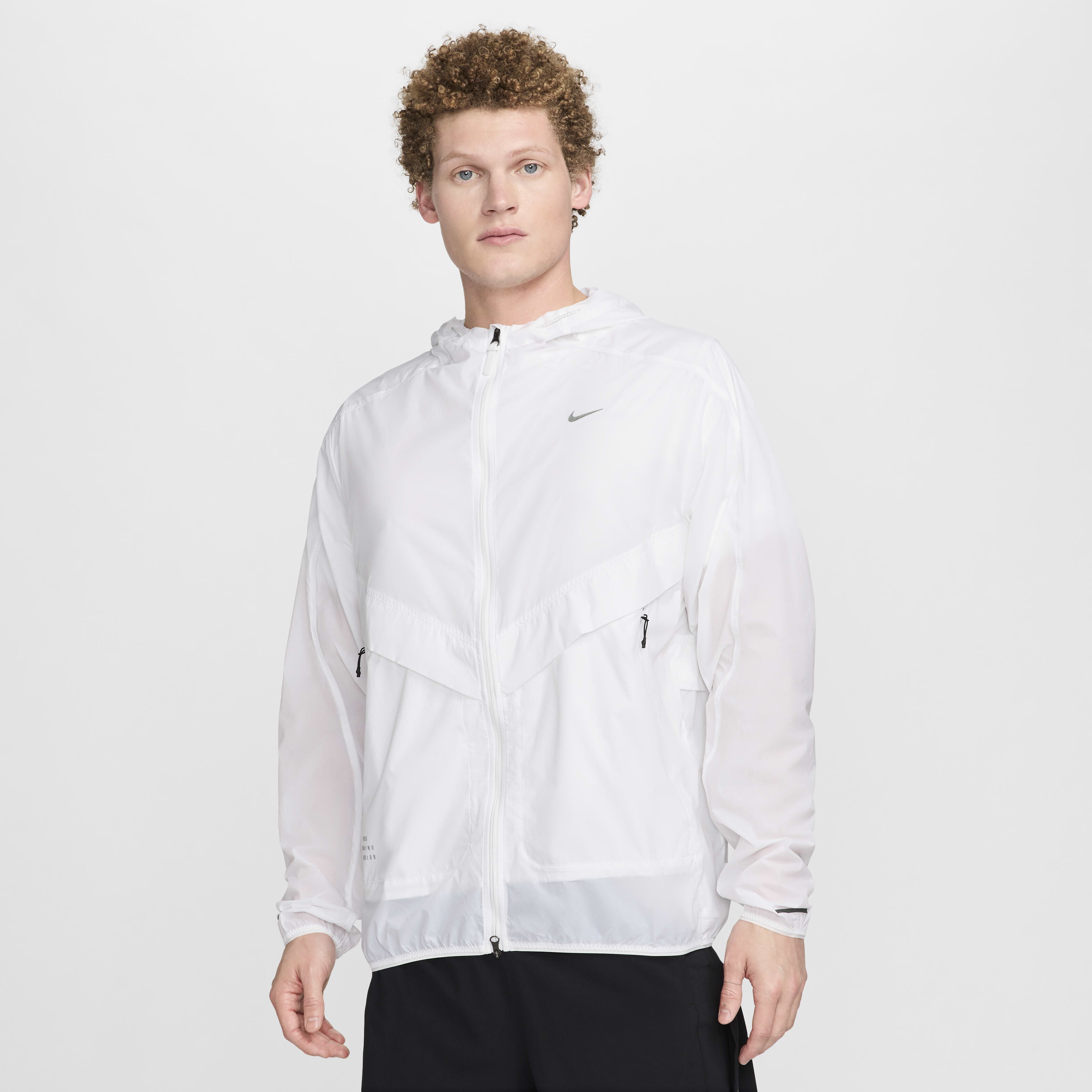 Buy Nike Running Division Men s UV Running Jacket Summit White Black Nike UAE Official