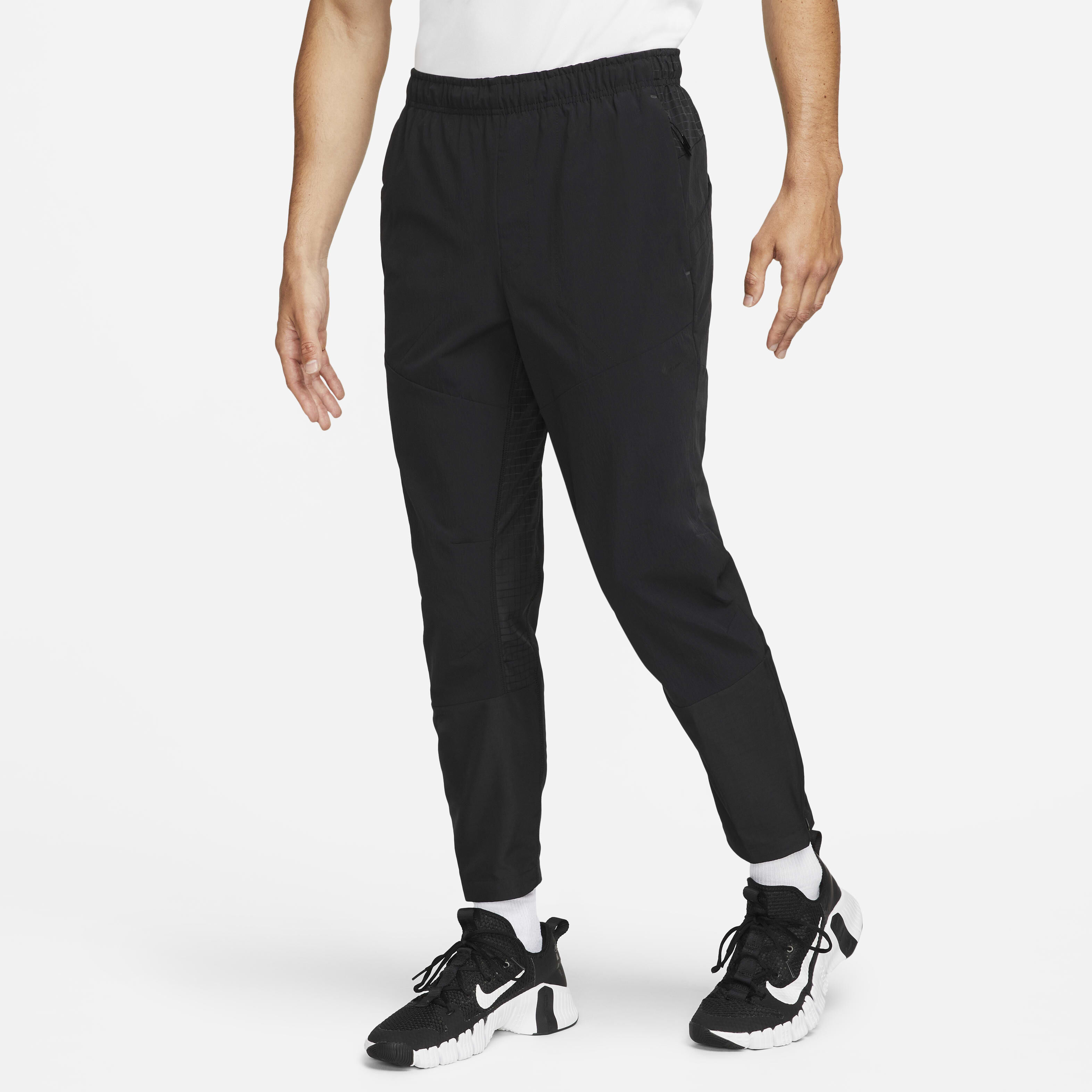 Buy Nike APS Men s Dri FIT ADV Woven Versatile Trousers Nike UAE Official