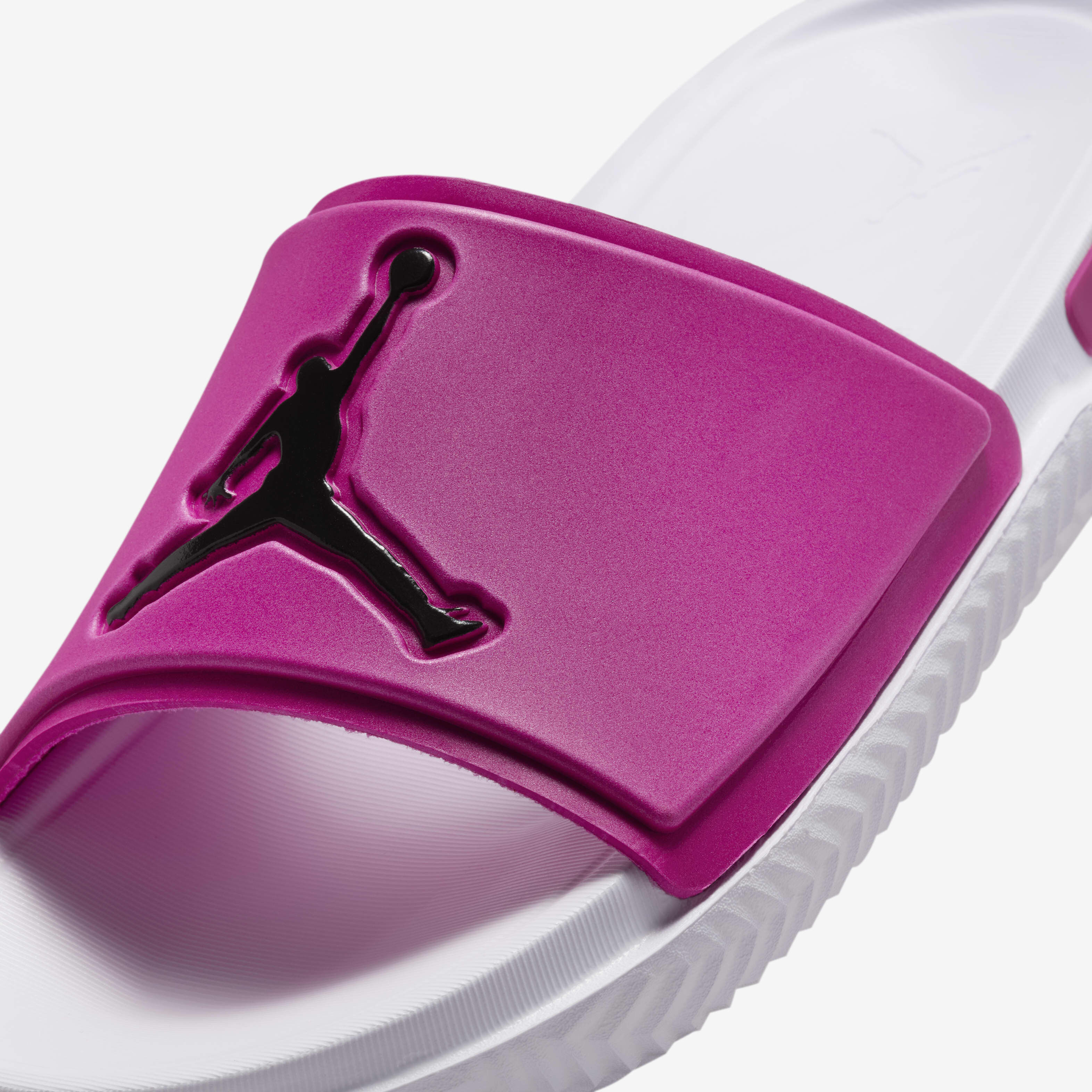 pink and white jordan slides