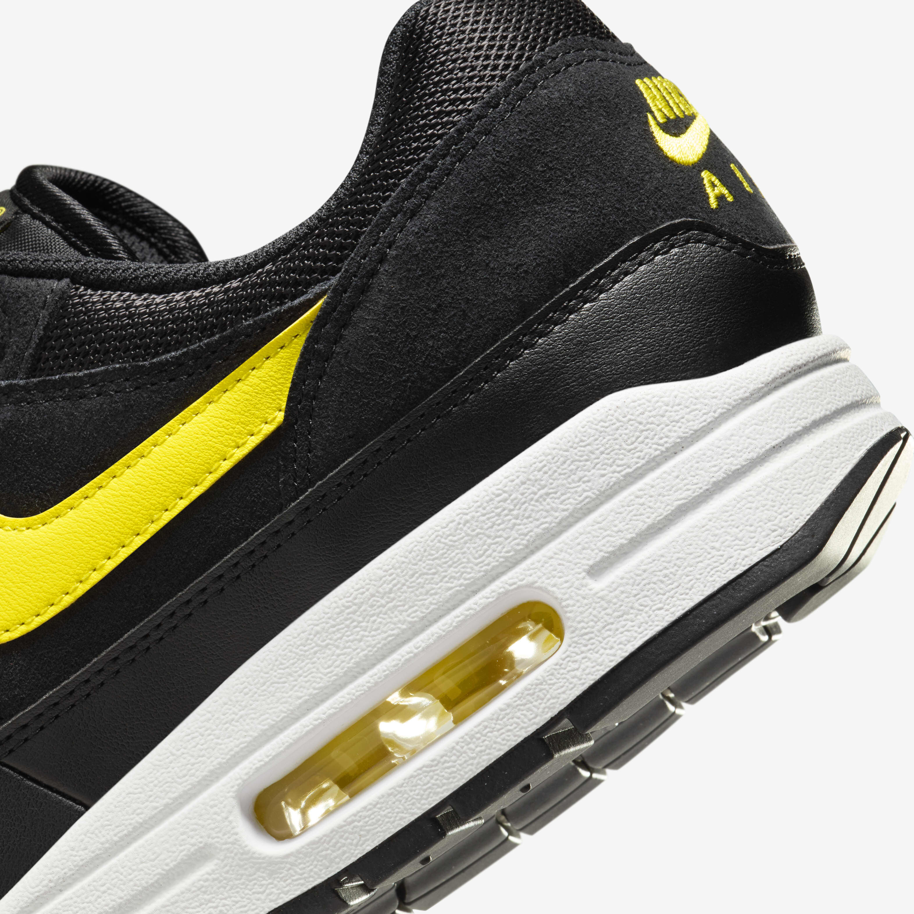 Yellow and black nike air best sale