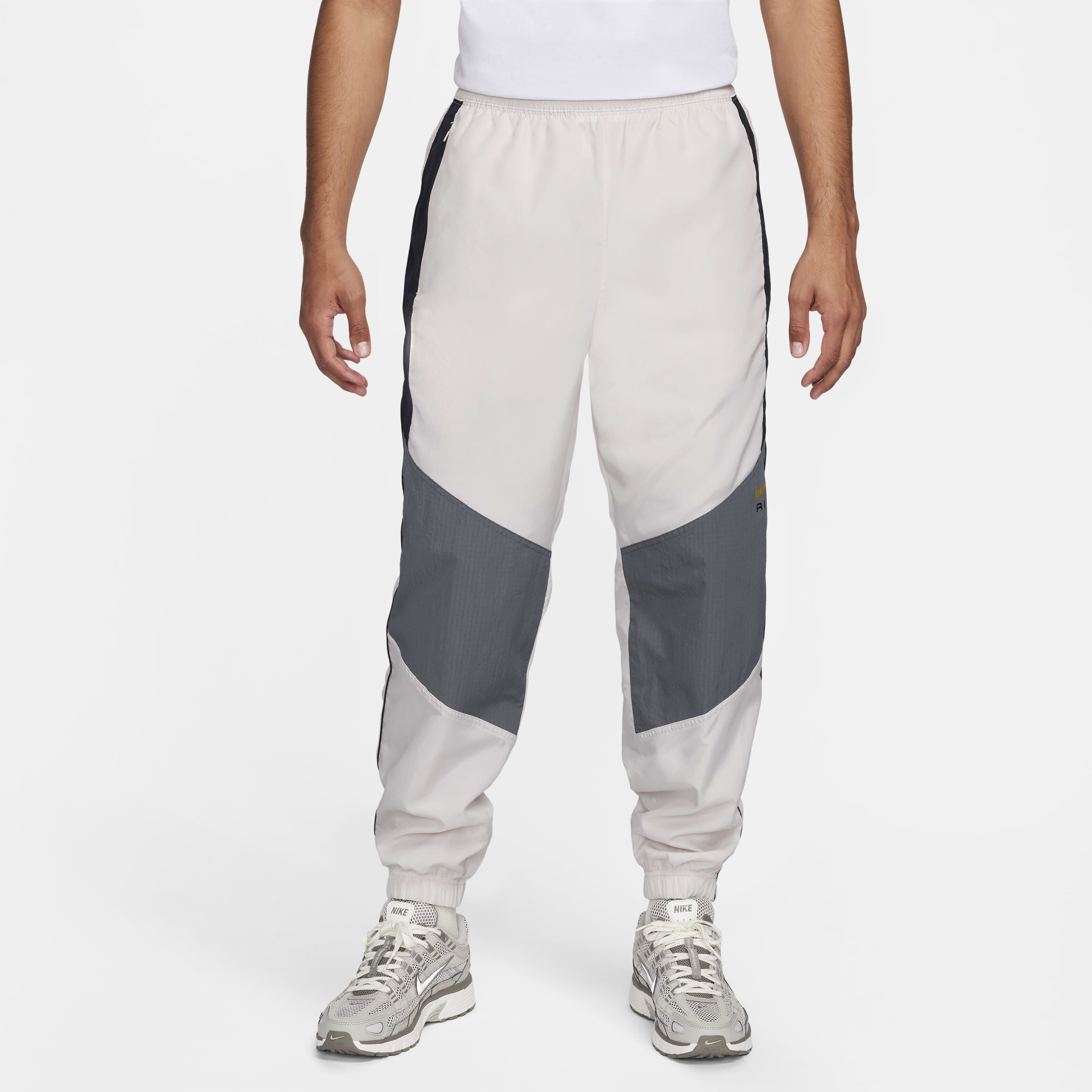 Buy Nike Air Men s Woven Trousers Light Orewood Brown Iron Grey Black Nike UAE Official