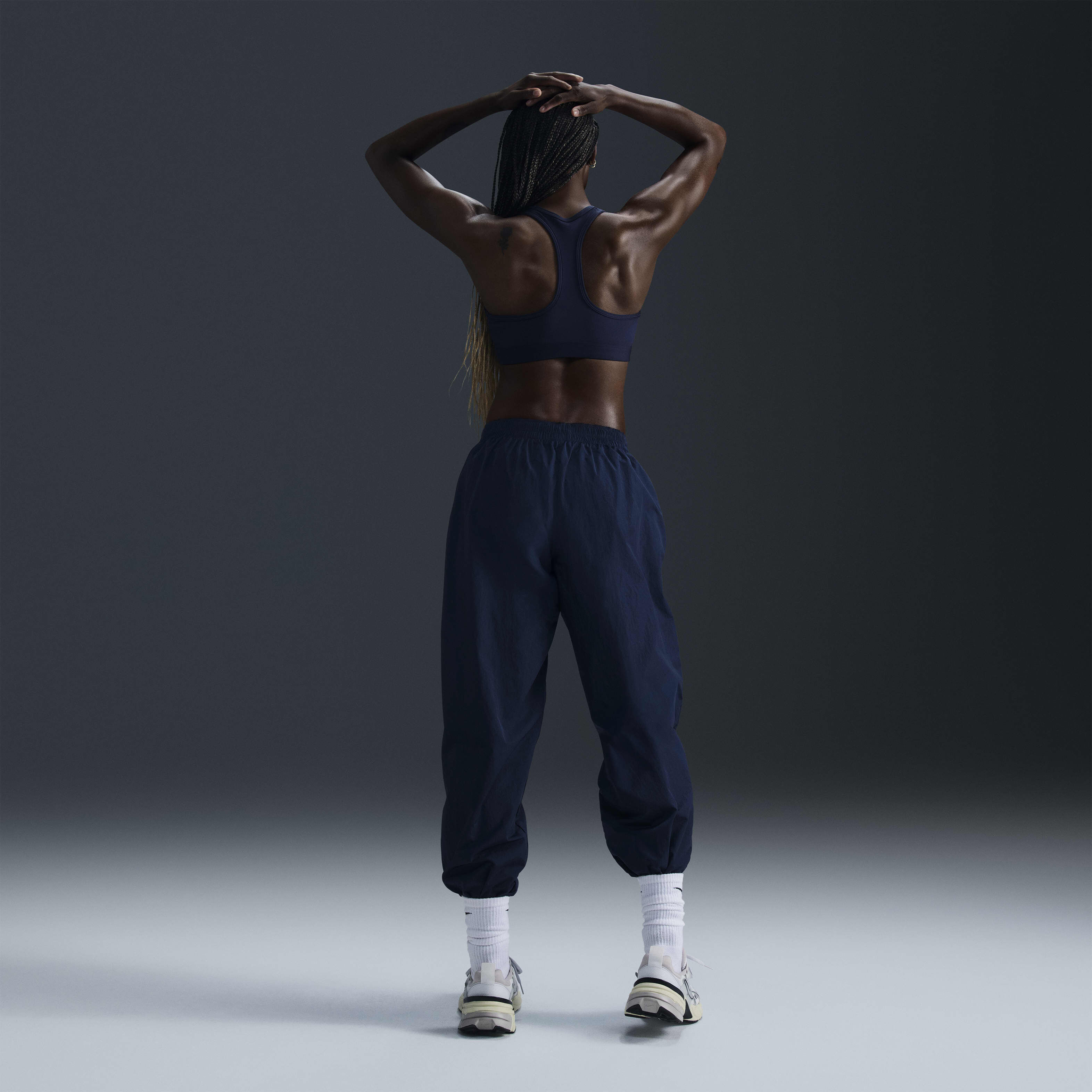 Buy Nike Sportswear Essential Women s Mid Rise Oversized Woven Joggers Nike UAE Official