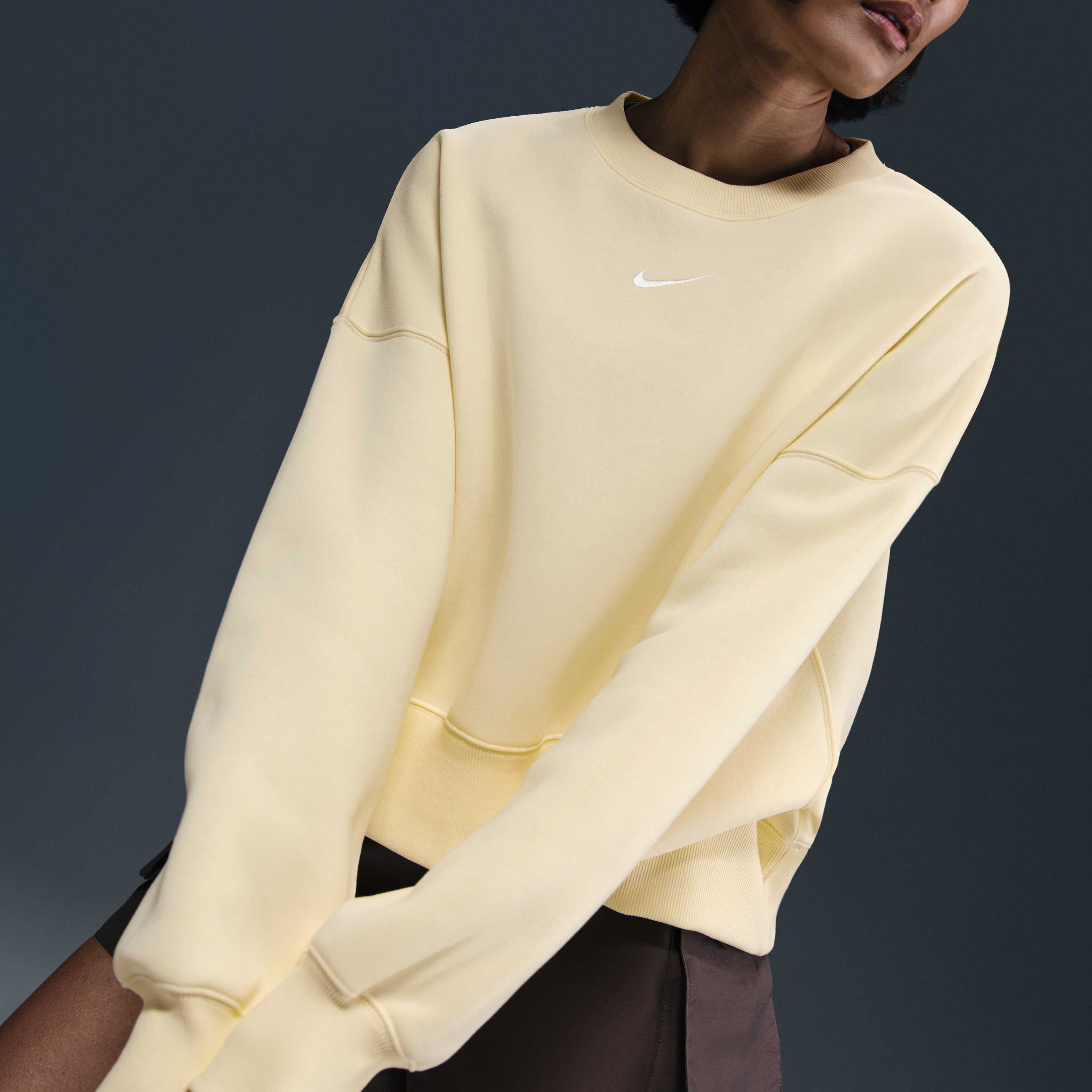 pastel yellow nike crewneck