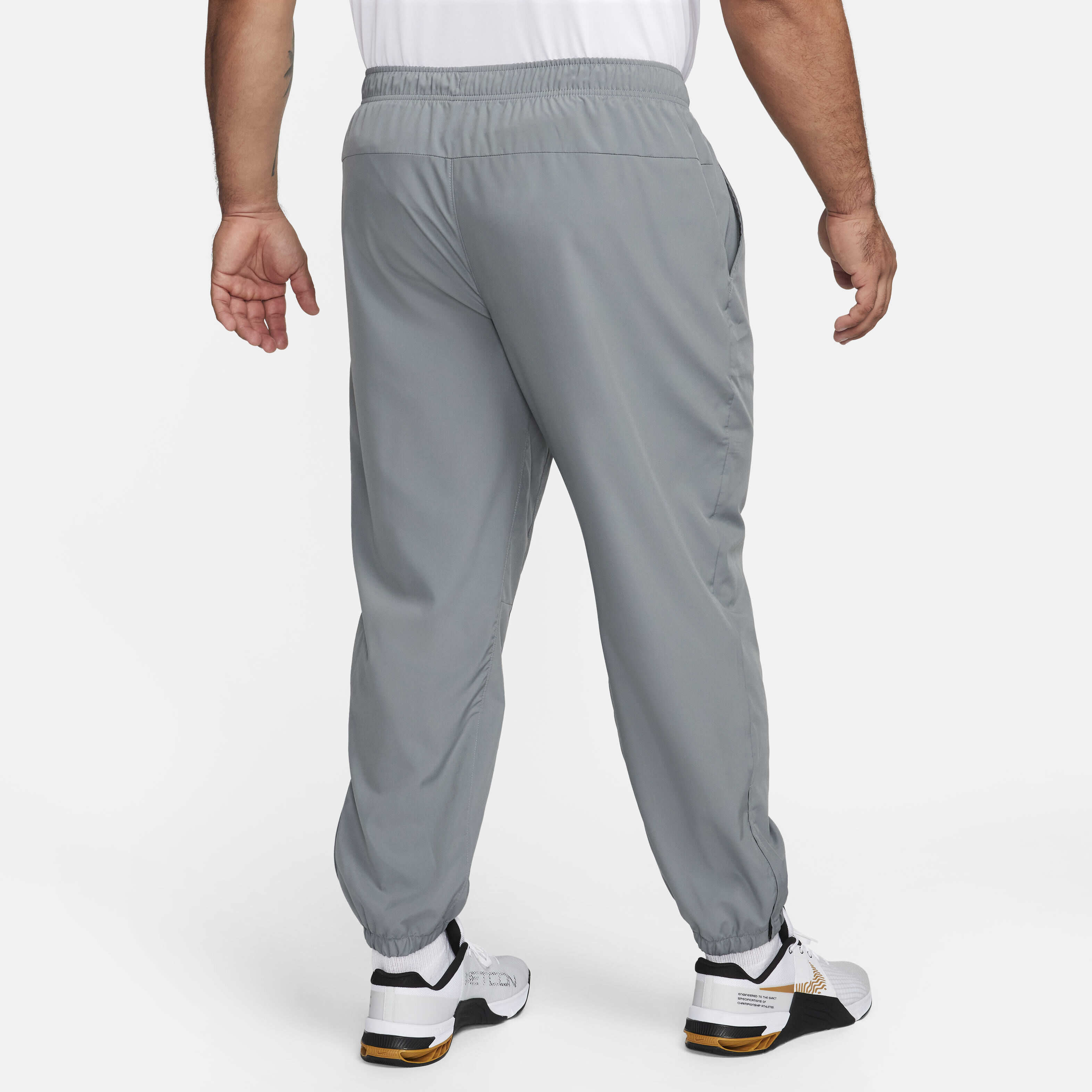 nike guppy track pants