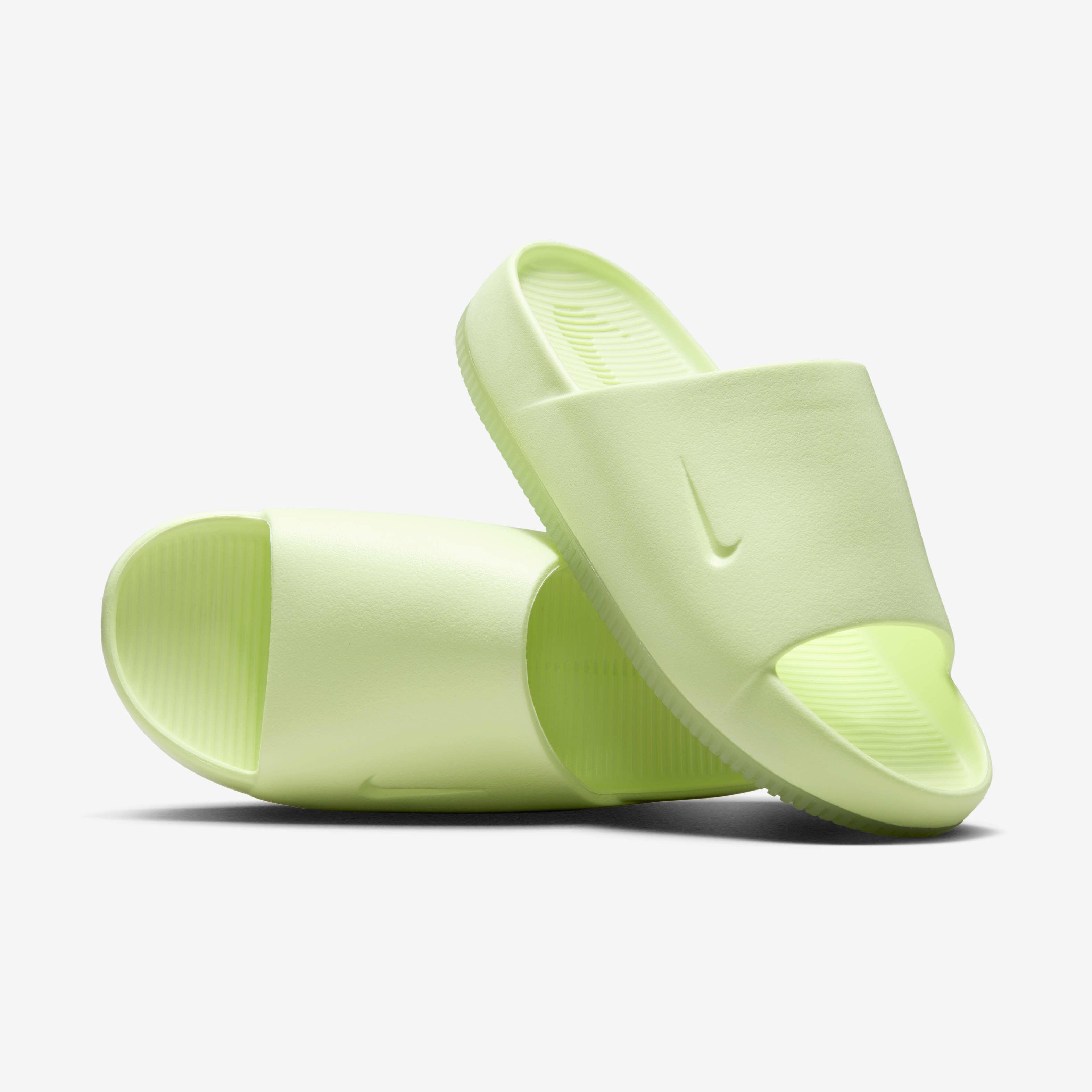 Buy Nike Calm Women s Slides Barely Volt Barely Volt Nike UAE Official