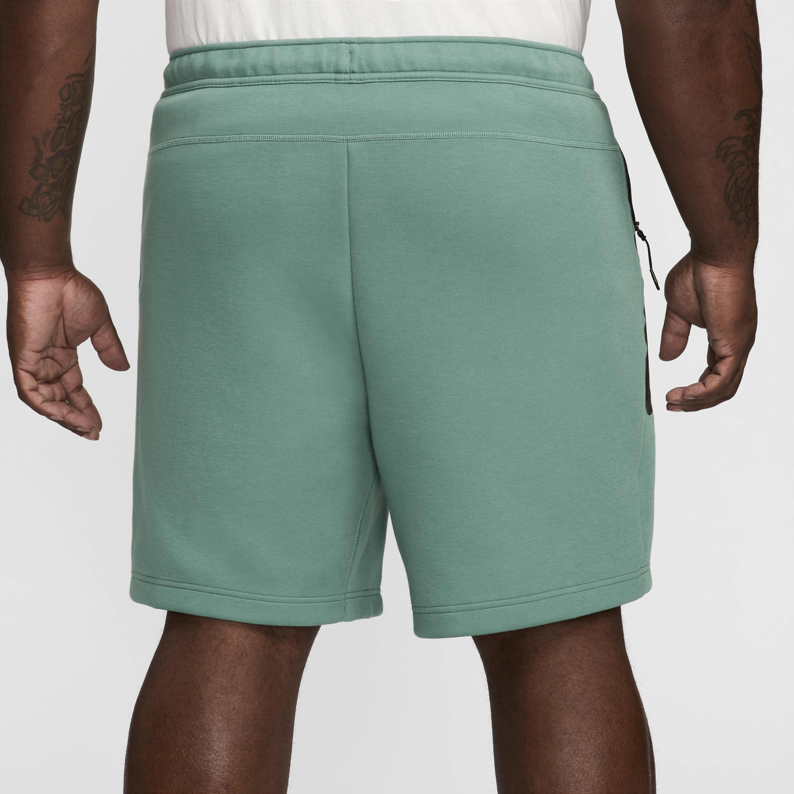 Blue nike tech shorts top