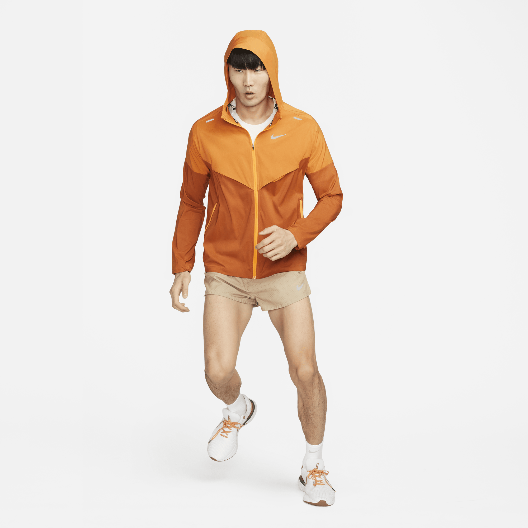 Nike running jacket orange sales