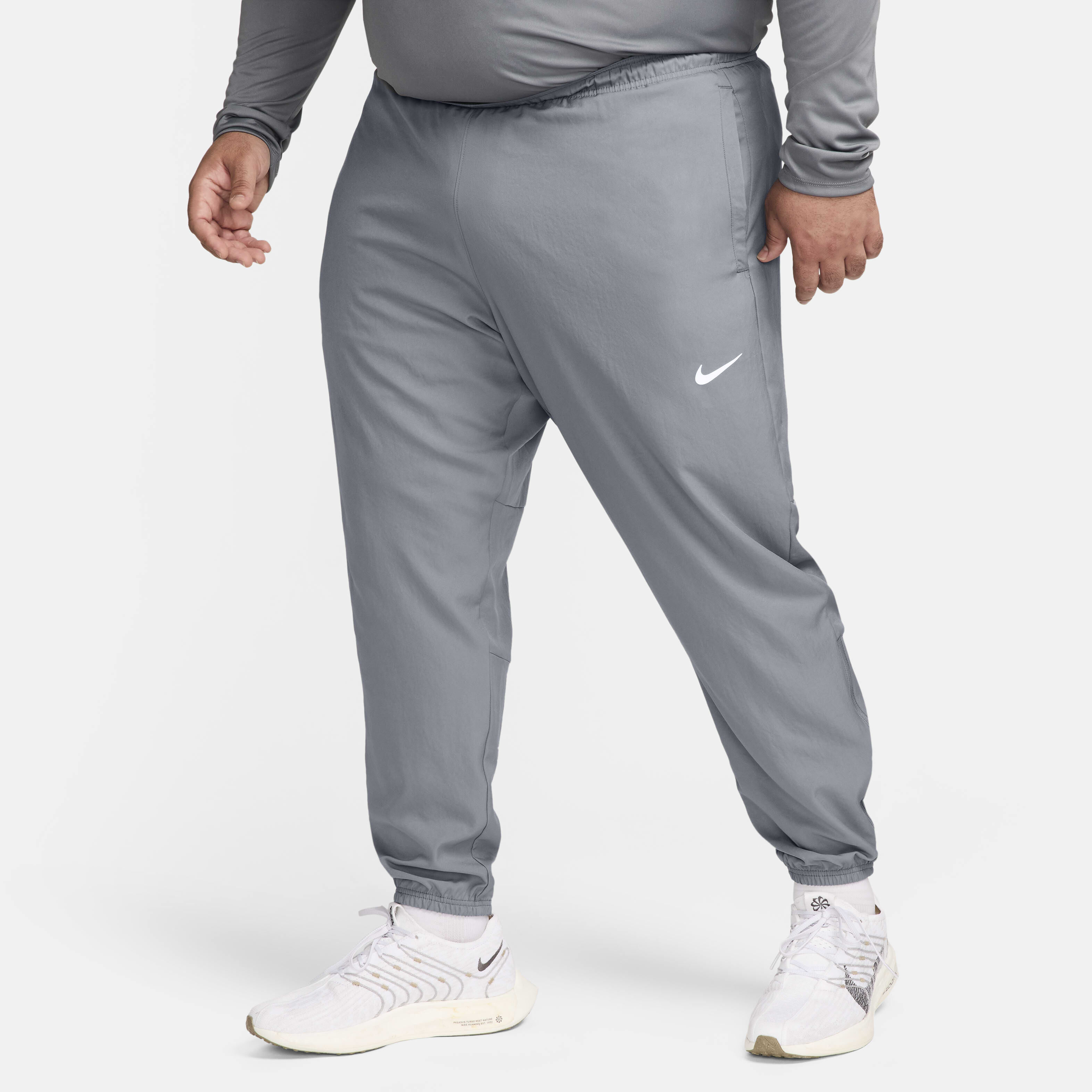 nike essential woven pants grey