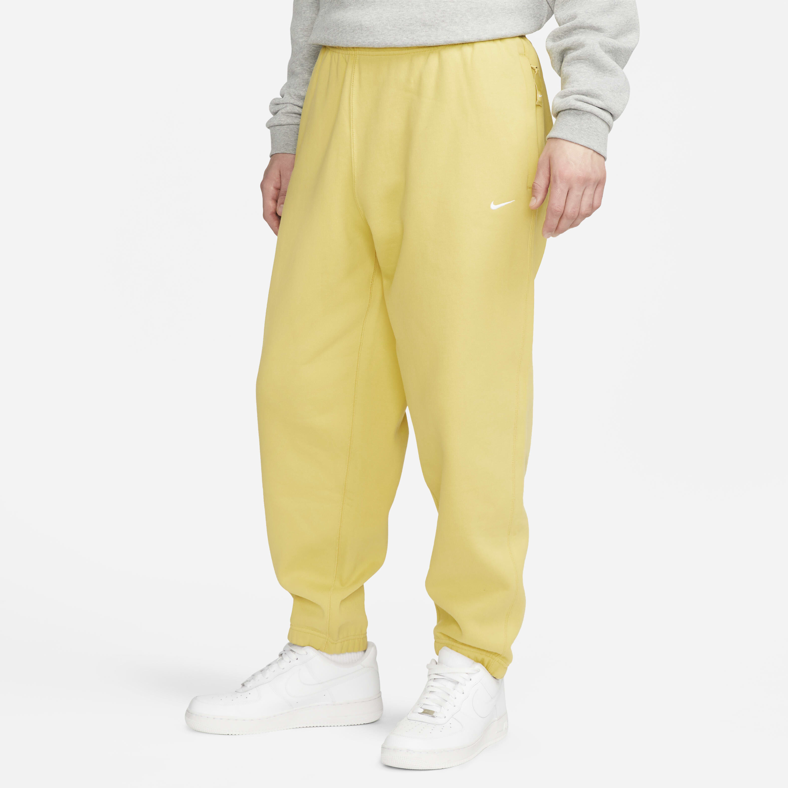 Buy Nike Solo Swoosh Men's Fleece Trousers Saturn Gold/White