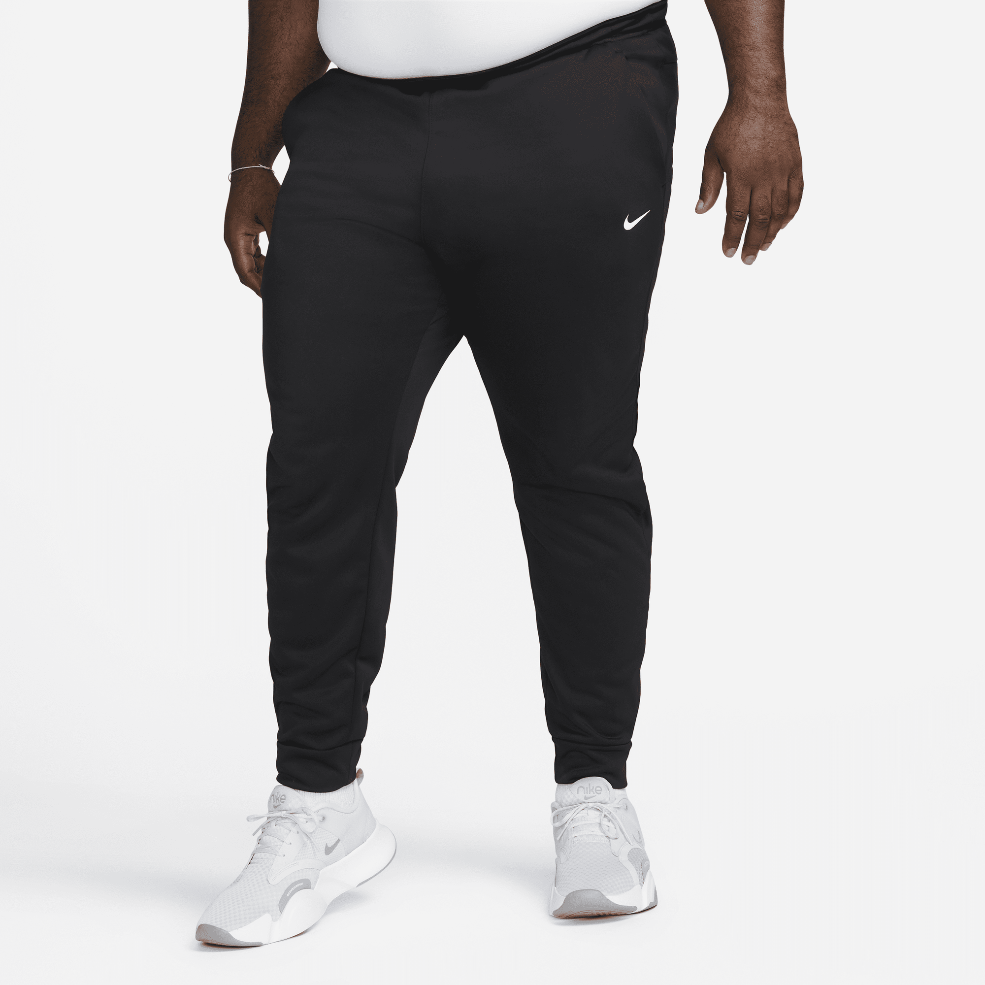 Shop Therma Men s Therma FIT Tapered Fitness Trousers Nike UAE