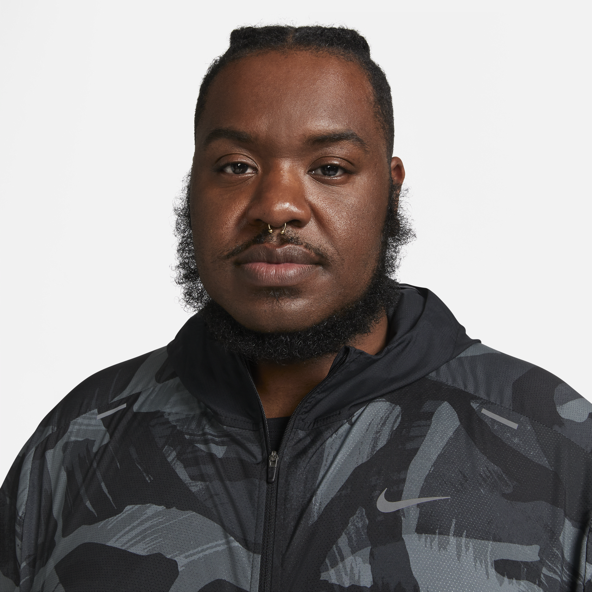 Nike essential running jacket hotsell camo