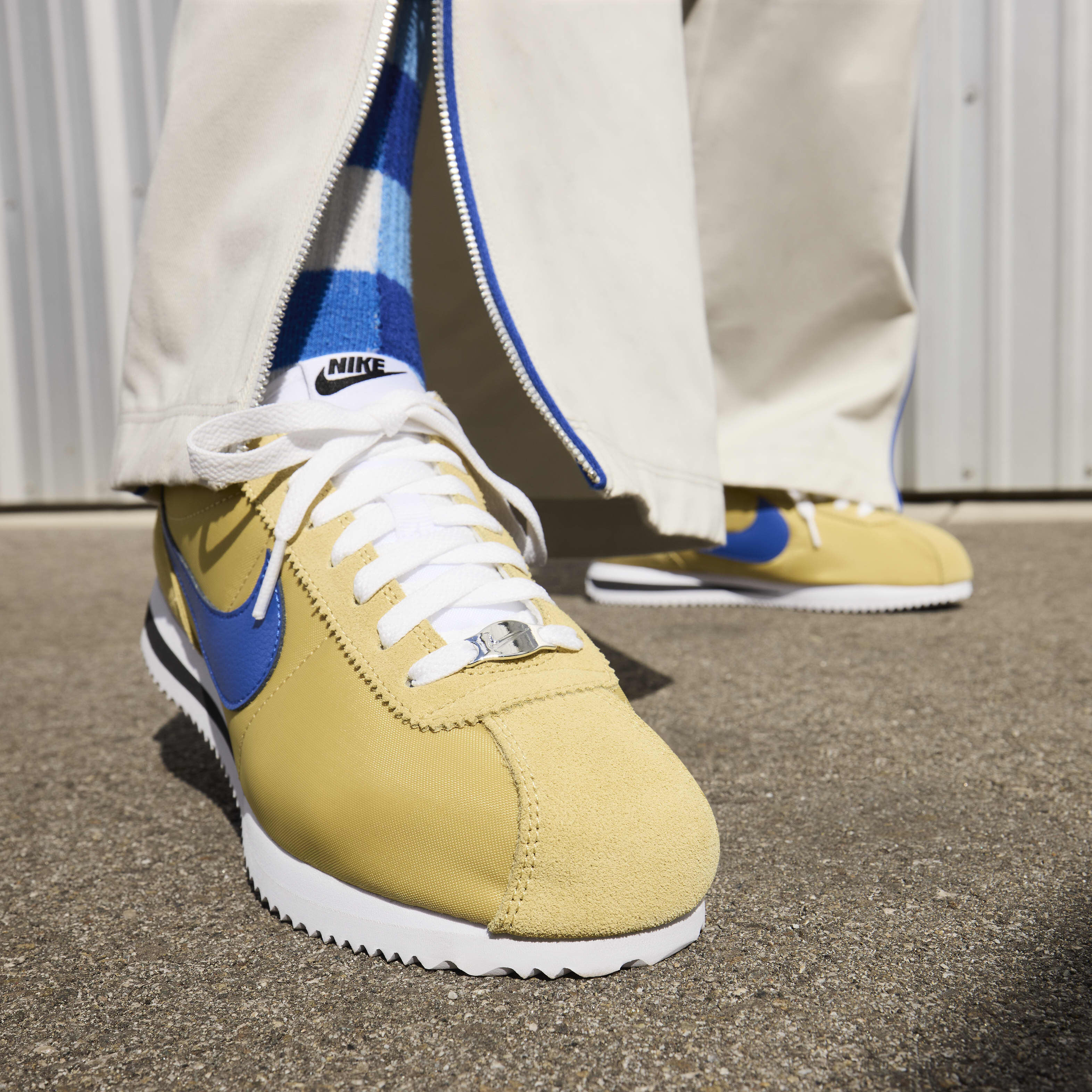 Yellow and blue nike cortez top