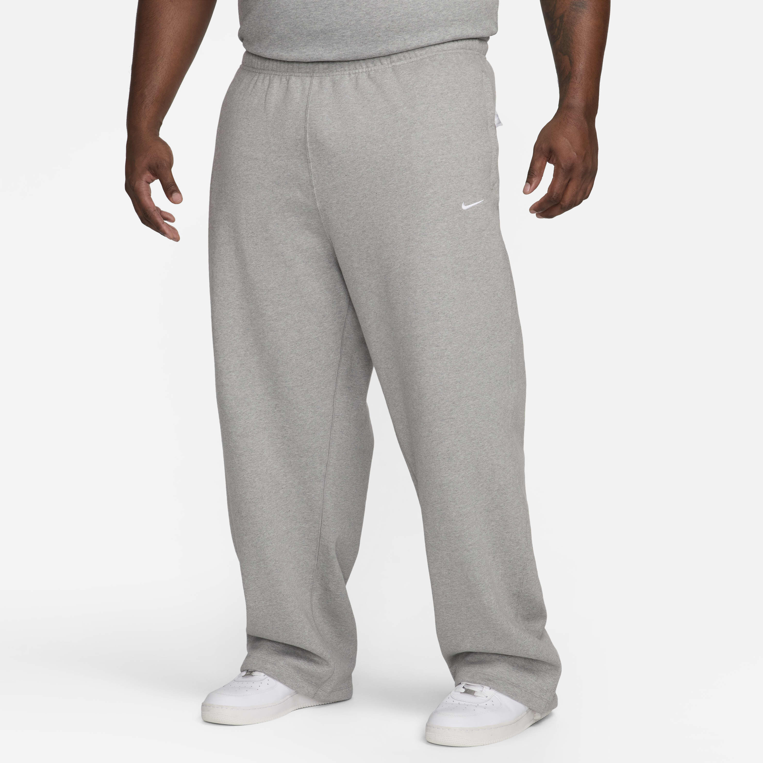Grey nike sweatpants open bottom deals