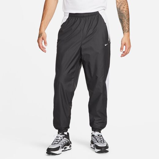 Nike slim best sale fit pants mens